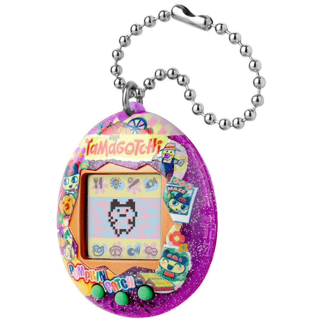 Fioletowe błyszczące Tamagotchi z łańcuszkiem, cyfrowym zwierzakiem na ekranie i naklejkami.