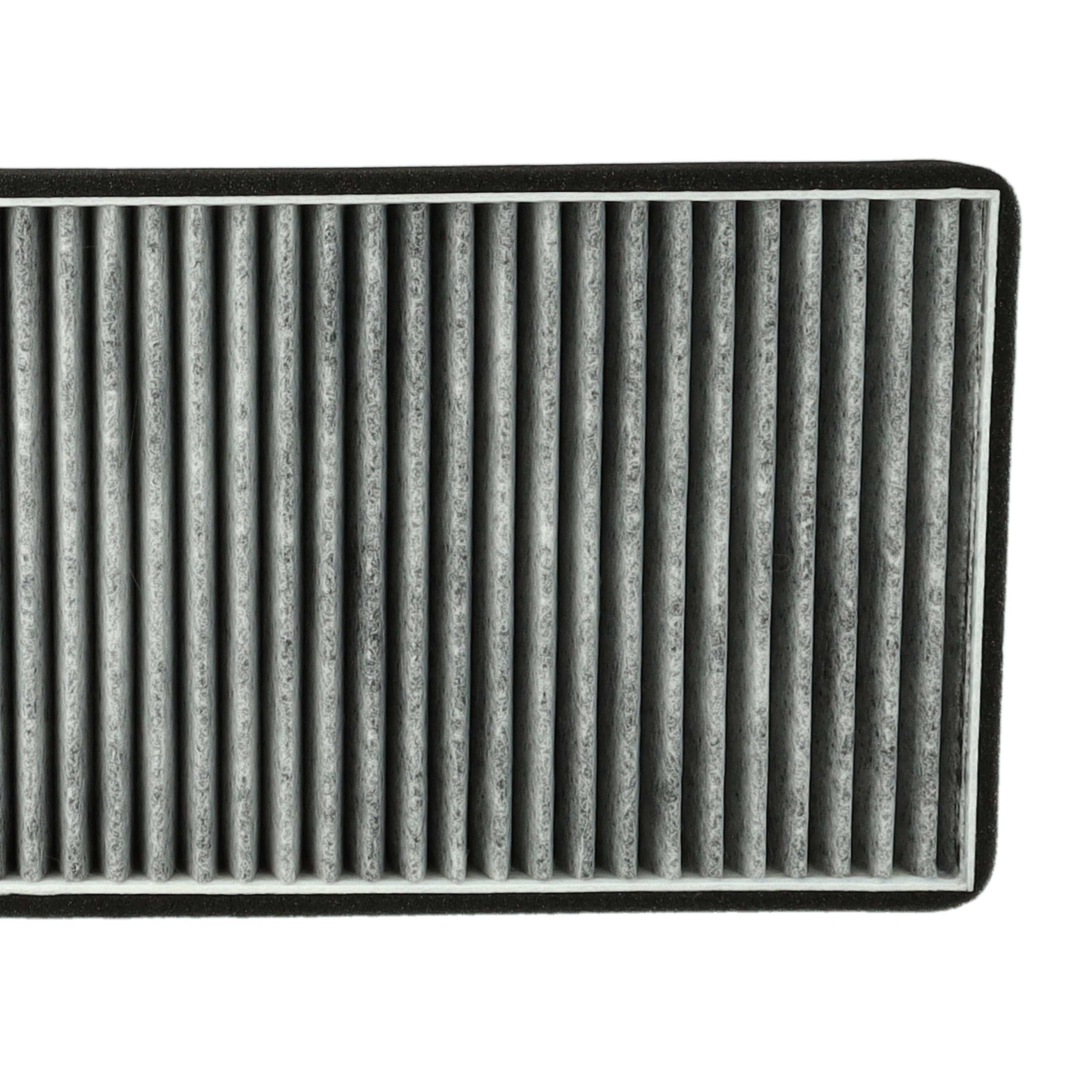 Ein grauer Auto-Innenraumfilter mit engen, parallelen Falten und schwarzem Rand auf weißem Hintergrund.