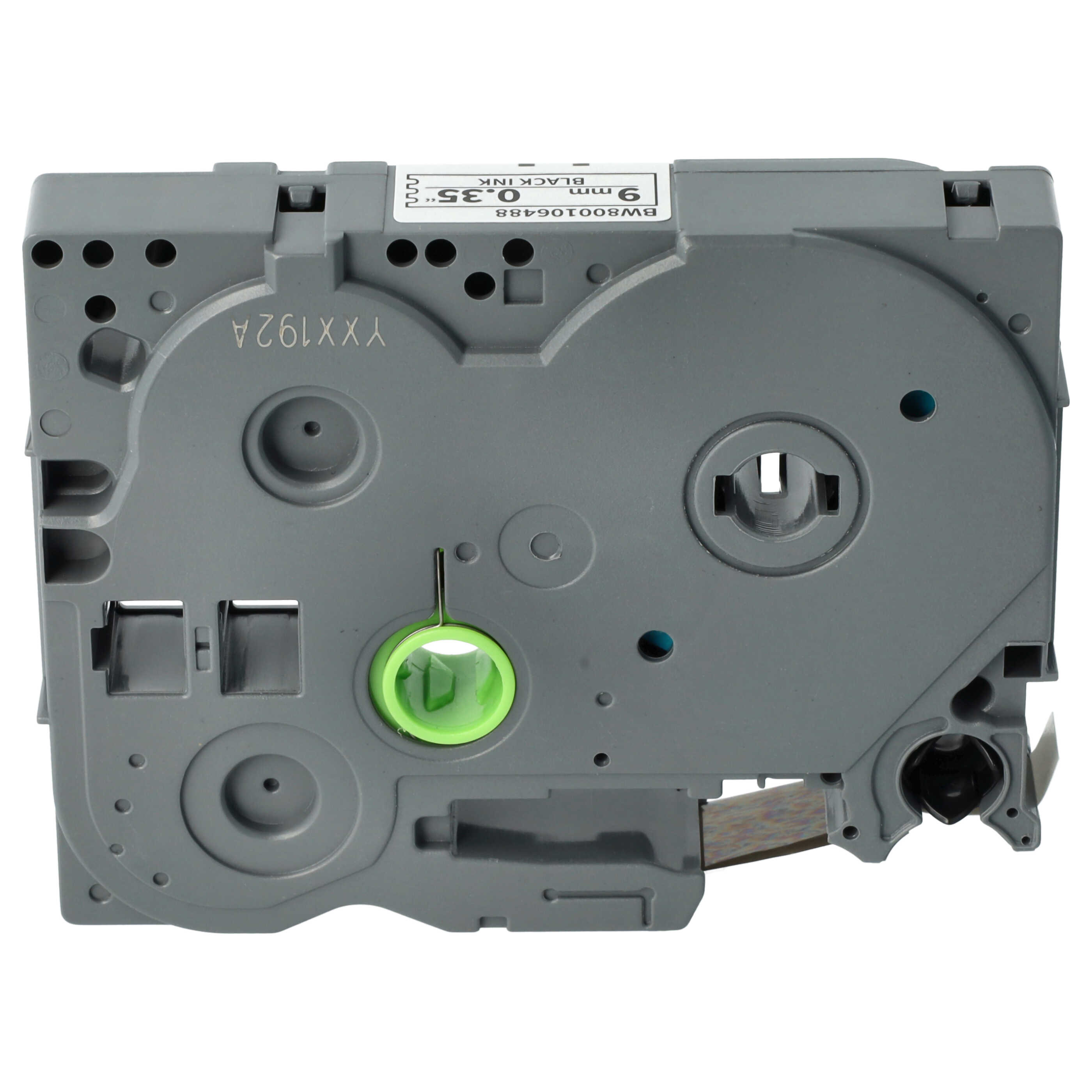 Graue Tintenkassette mit integriertem grünem Federmechanismus und einer Etikette oben auf weißem Hintergrund.