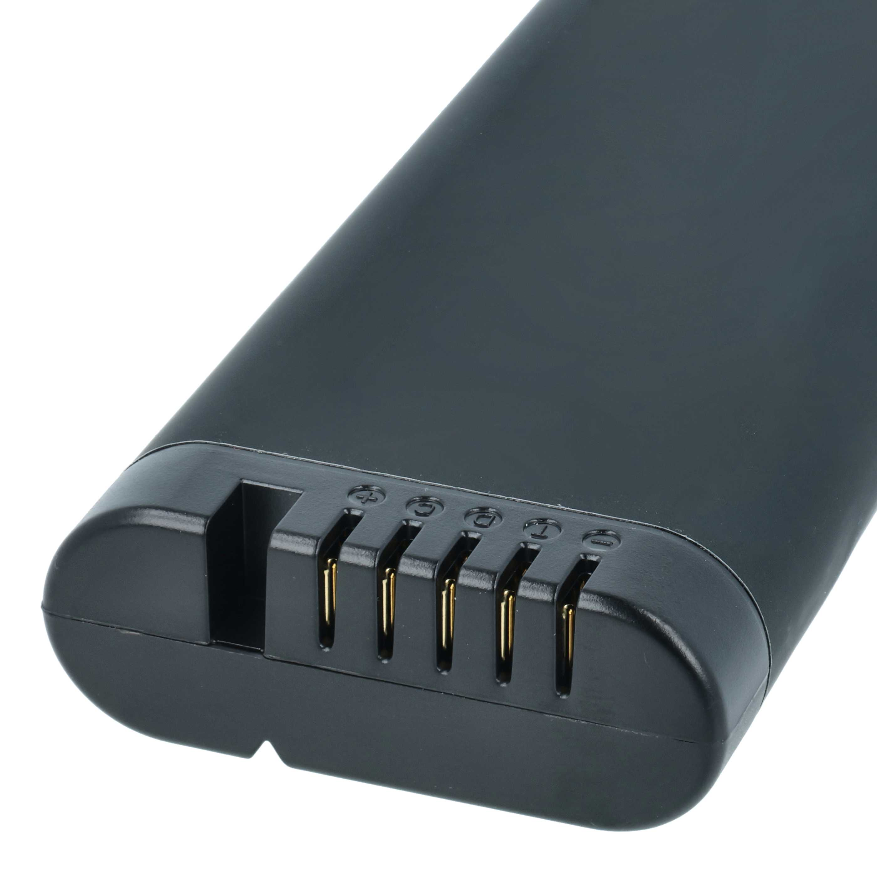 Ein schwarzes Elektronik-Batteriegehäuse mit goldenen Anschlussstiften und Symbols auf weißem Hintergrund.