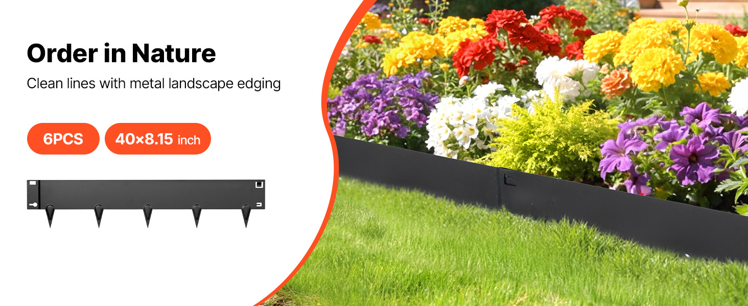 Schwarze Metall-Rasenkante trennt Rasen von einem bunten Blumenbeet mit gelben, roten und violetten Blüten.