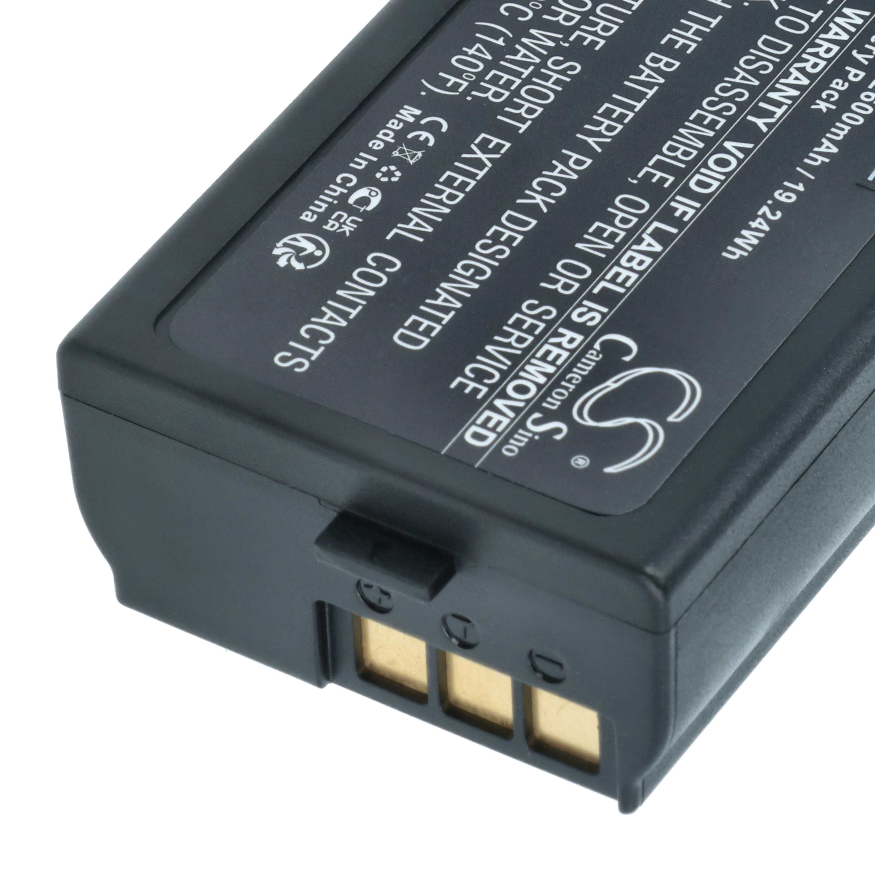 Nahaufnahme einer schwarzen Kameraersatzbatterie mit goldenen Kontakten und gedruckten Warnhinweisen.