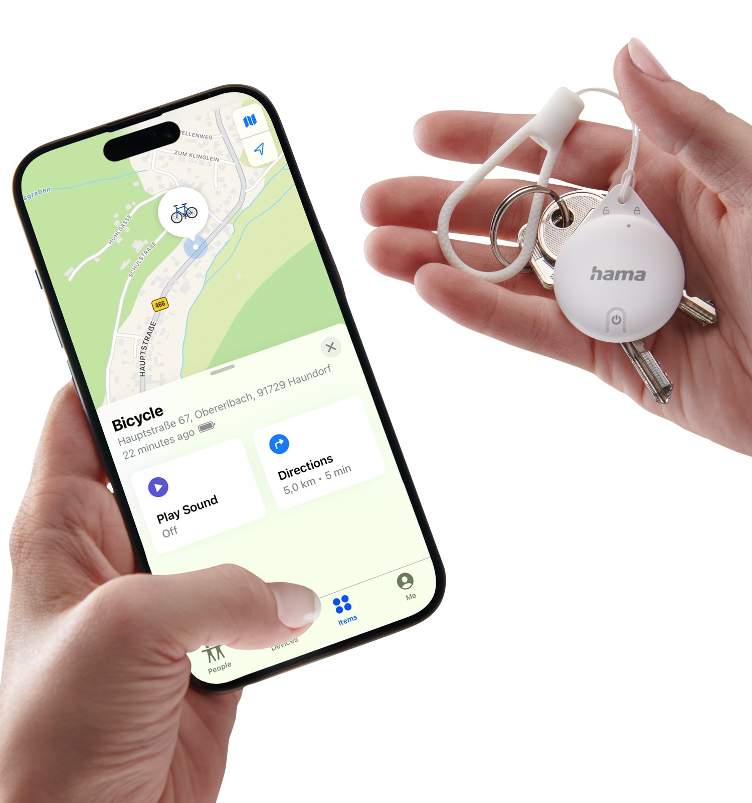 Smartfon pokazuje aplikację śledzenia roweru, a dłoń trzyma lokalizator kluczy Hama.