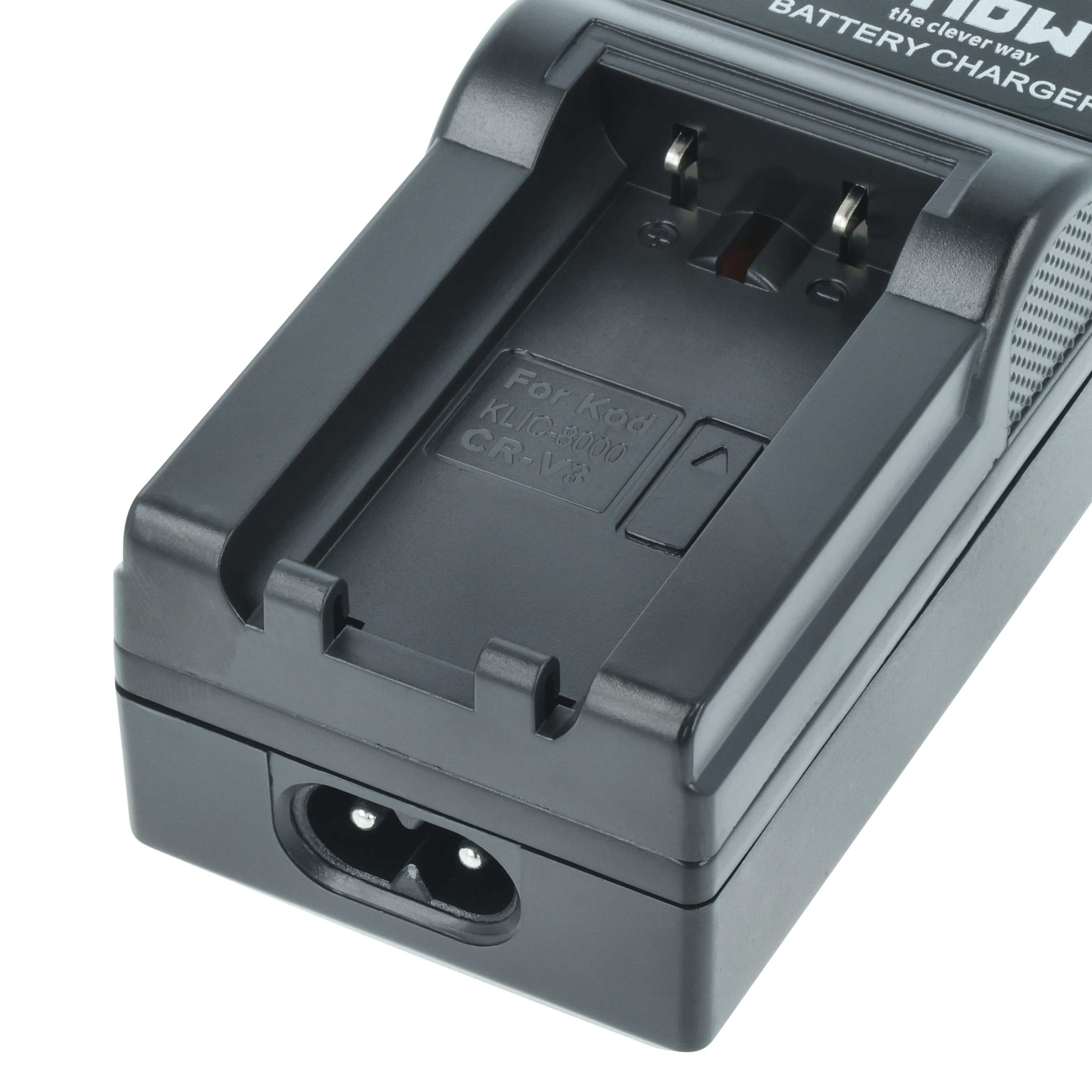 Ein schwarzes Batterie-Ladegerät mit einem Steckanschluss und Beschriftungen.