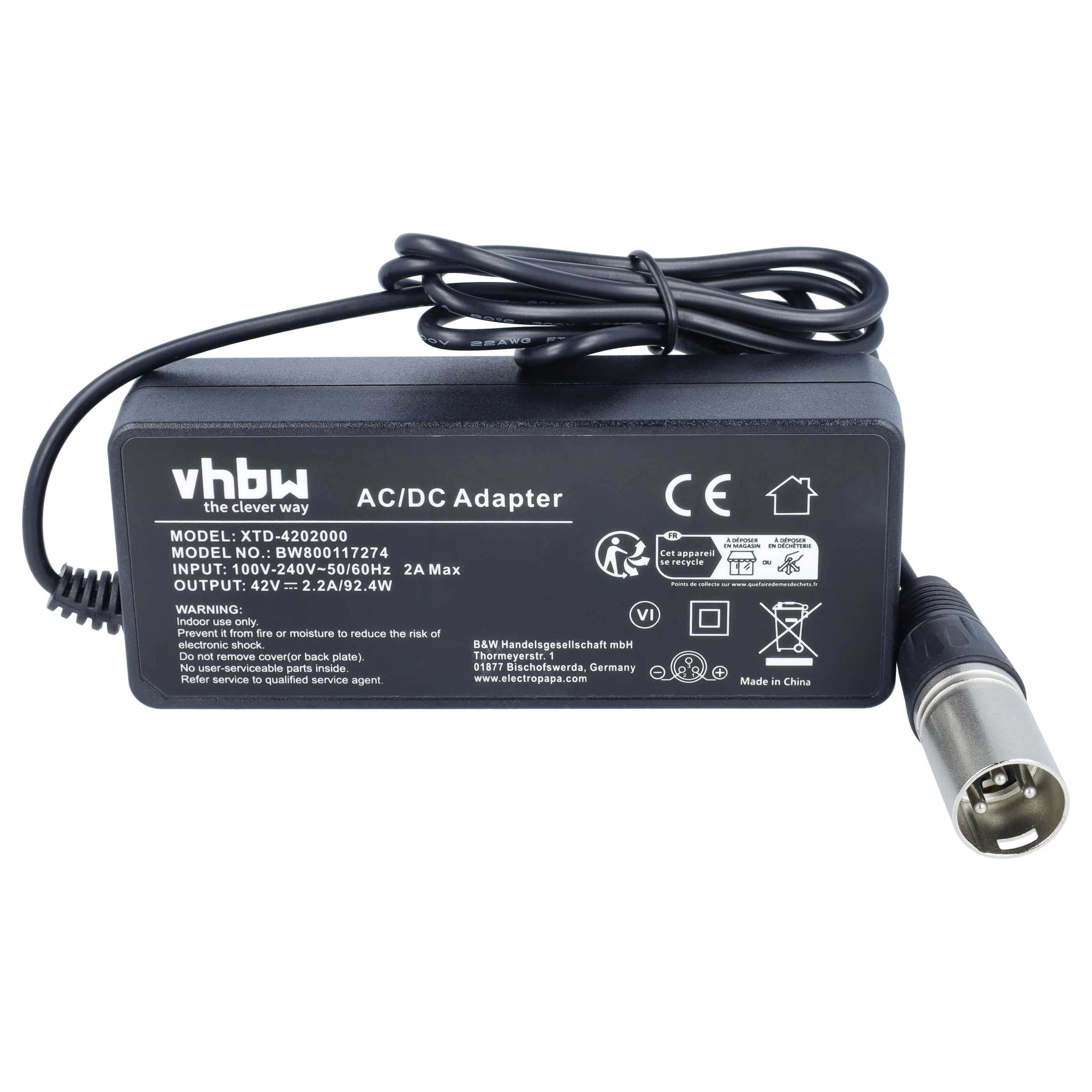 Ein schwarzer AC/DC-Adapter von vhbw mit aufgerolltem Kabel und einem runden Stecker auf einer weißen Oberfläche.