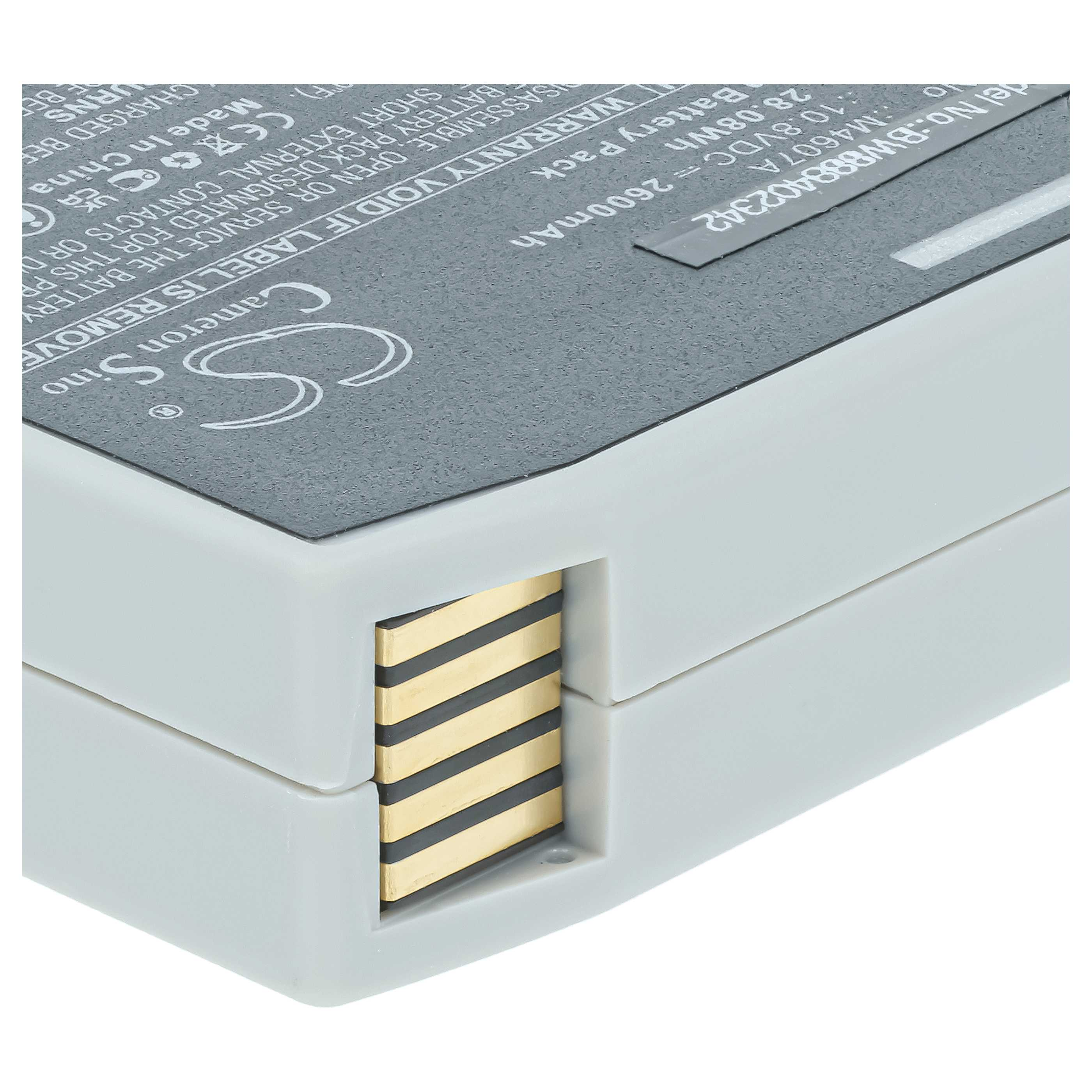 Nahaufnahme einer grauen Batterie mit sichtbaren Goldkontakten und gedruckten technischen Daten.