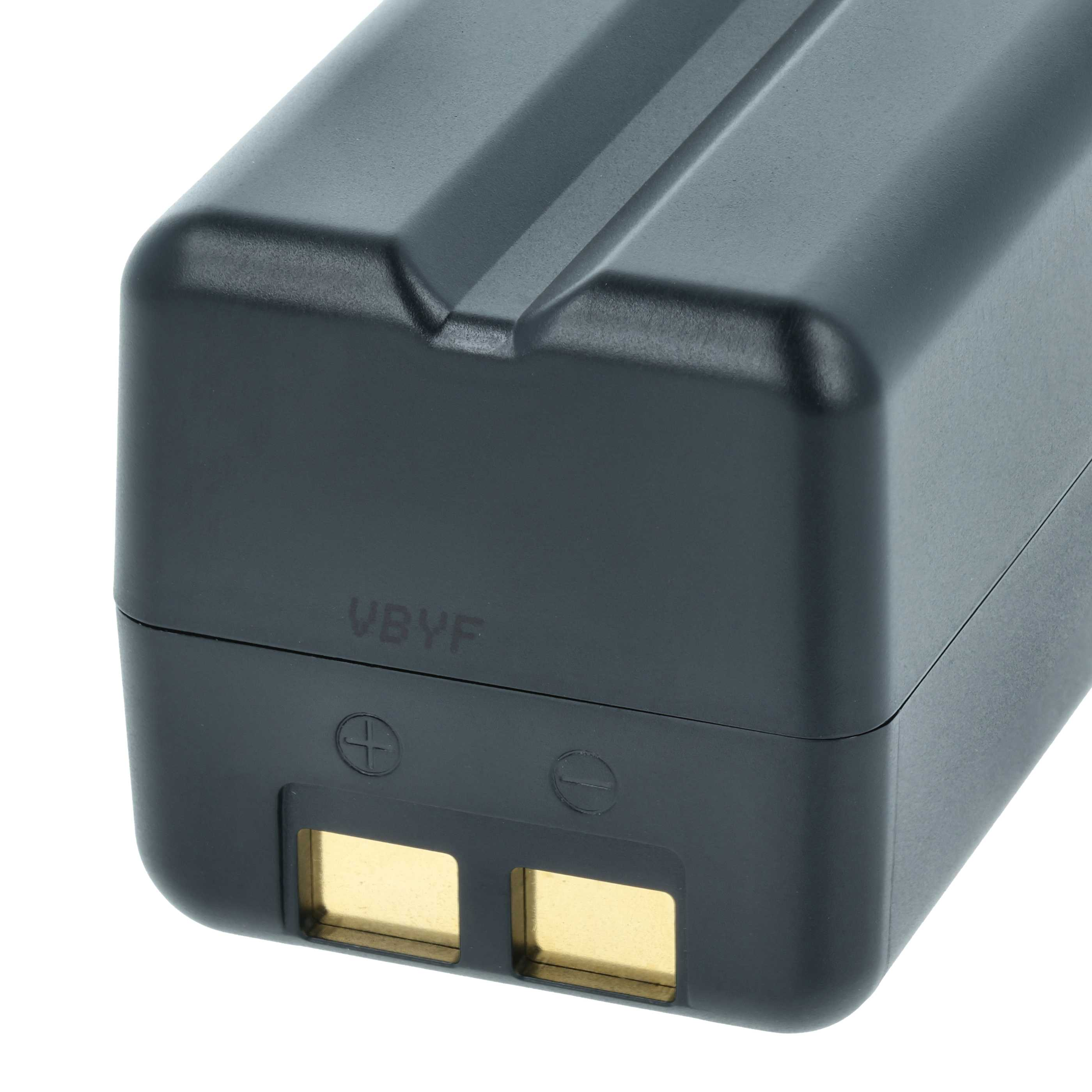 Schwarzes Batteriegehäuse mit goldenen Kontakten und Polaritätsmarkierungen.
