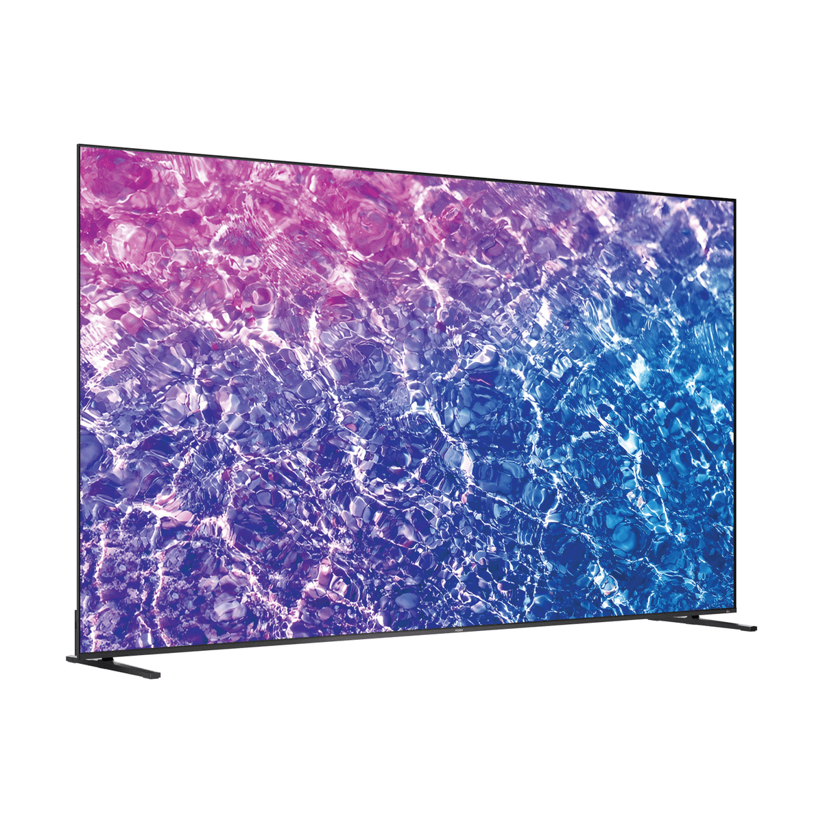 Un televisor elegante muestra un patrón de agua abstracto en rosa y azul sobre fondo blanco.
