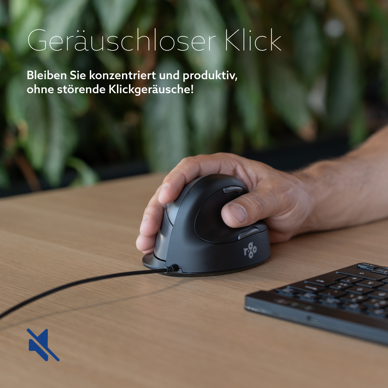 Hand operating a black ergonomic vertical mouse on a wooden surface with a keyboard.