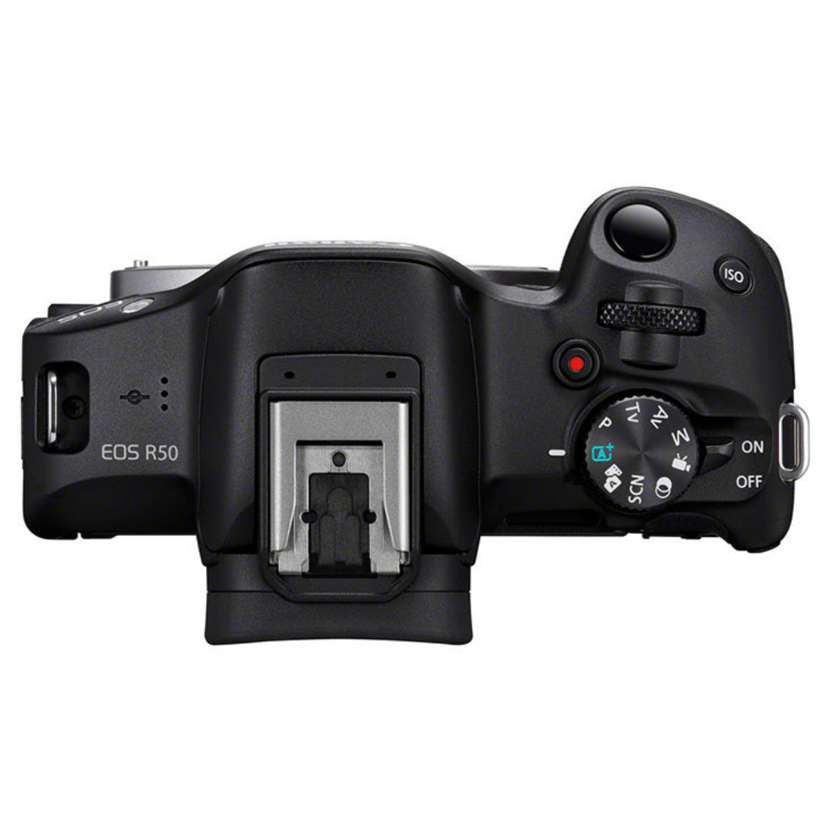 Vista superior de una cámara negra Canon EOS R50 con el dial de modo, disparador y zapata.