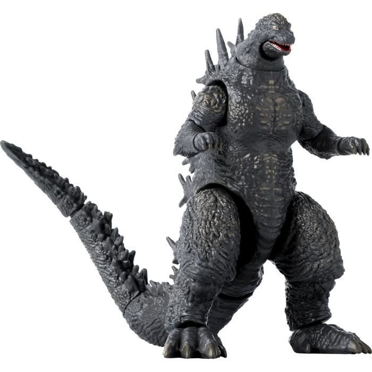 Szara figurka akcji Godzilla z kolcami grzbietowymi i długim ogonem na białym tle.