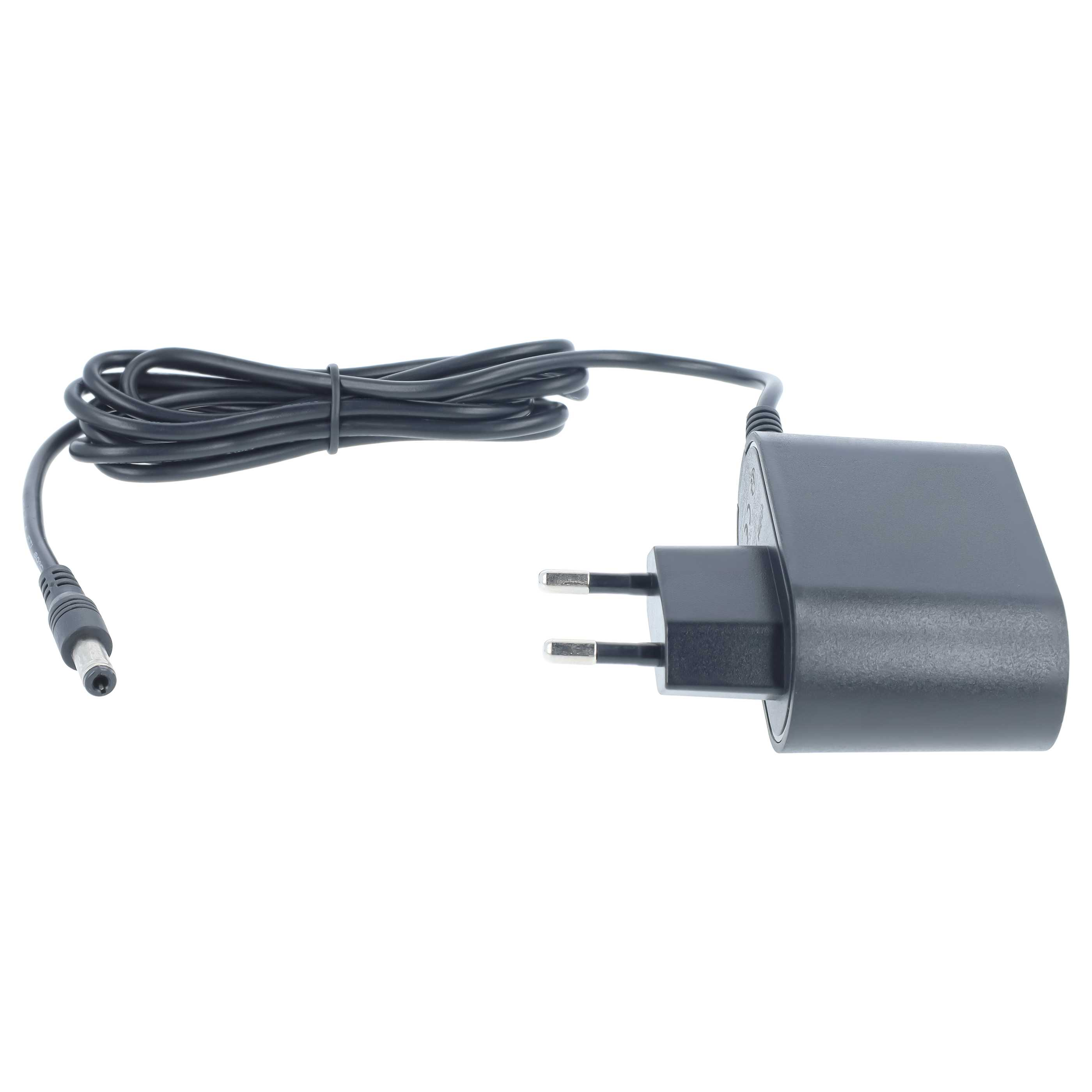 Schwarzes Steckernetzteil mit EU-Stecker und aufgewickeltem Kabel auf weißem Hintergrund.