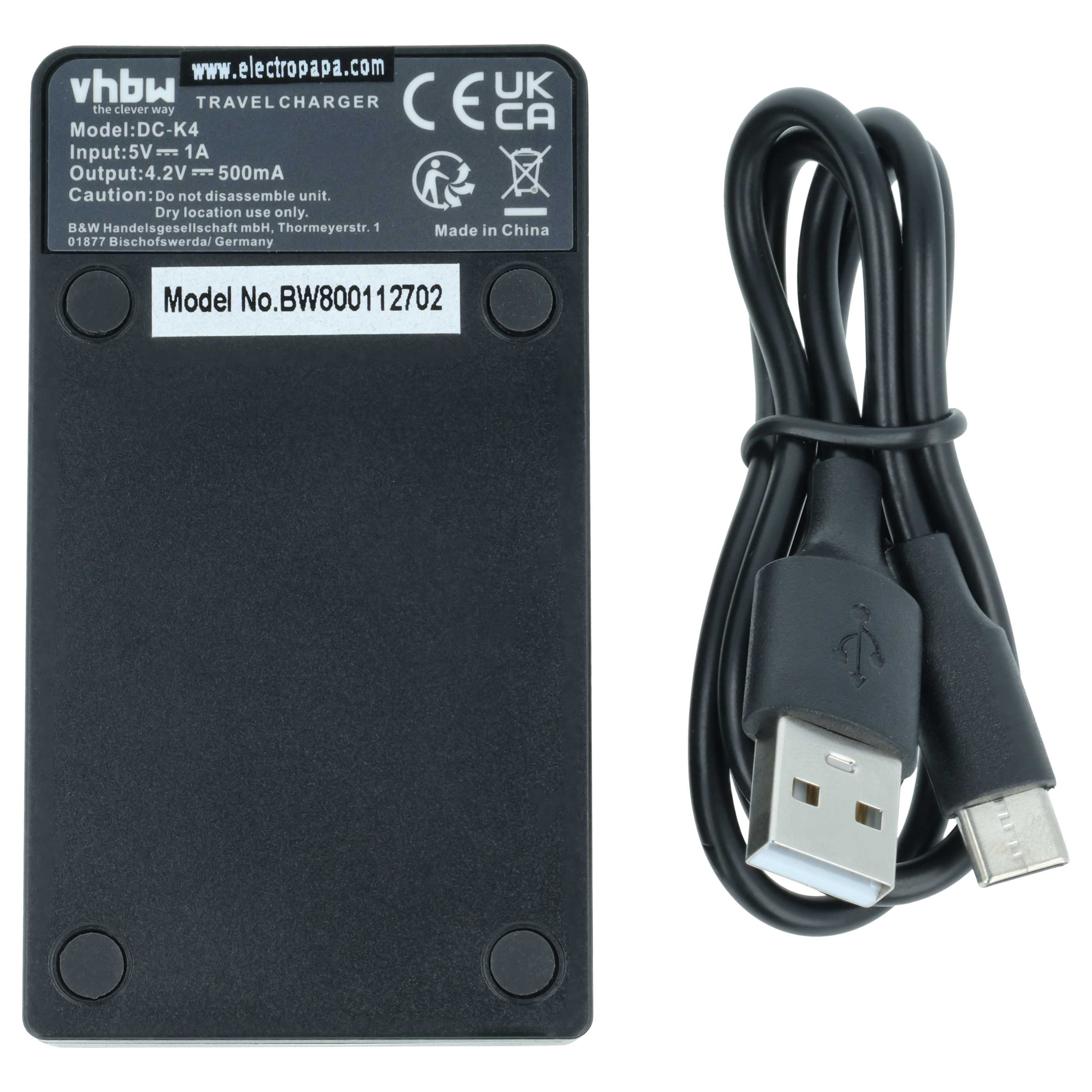 Schwarzes vhbw-Reiseladegerät mit weißem Etikett und schwarzem USB-Kabel auf weißem Hintergrund.