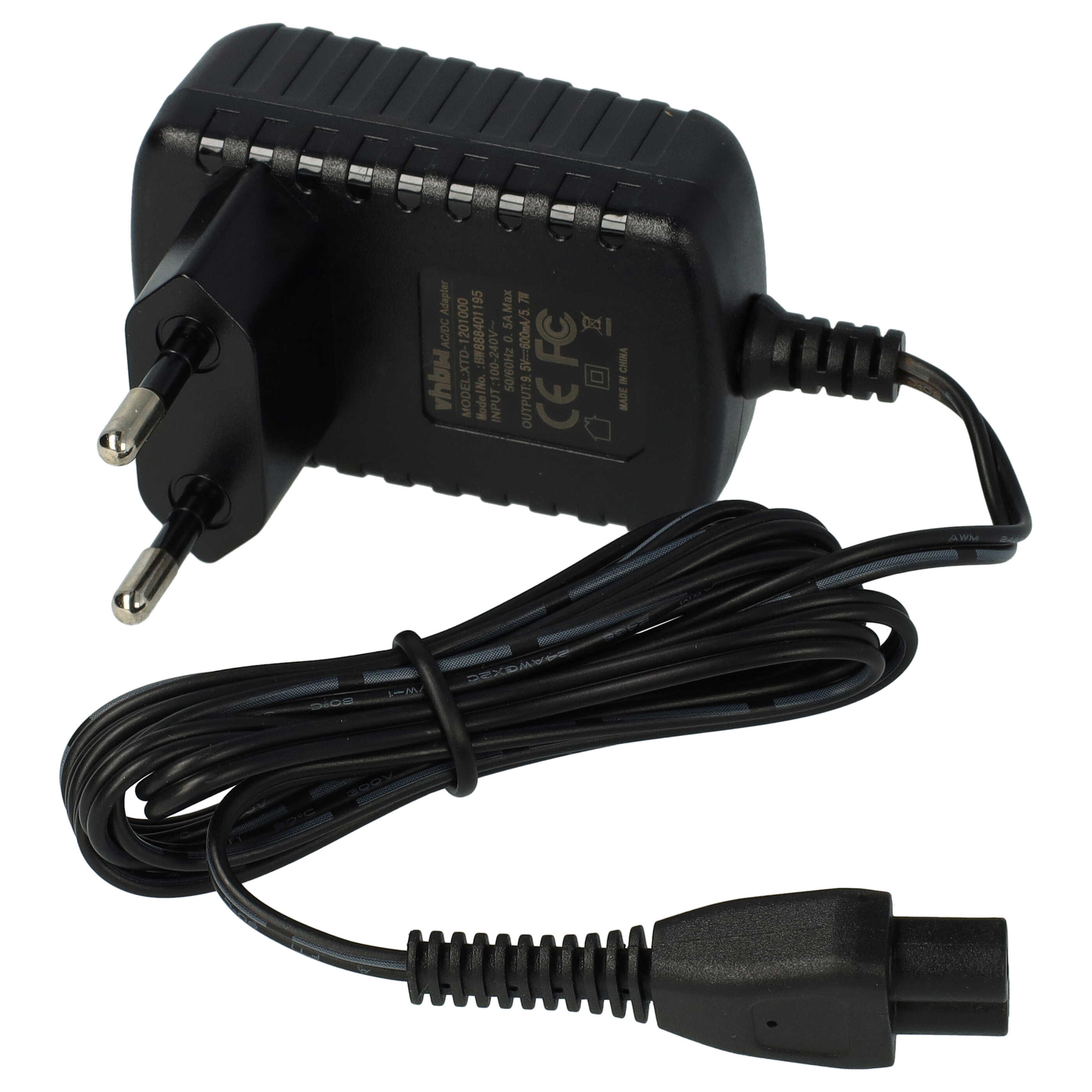 Schwarzes Netzteil mit Eurostecker und aufgerolltem Kabel auf weißem Hintergrund.