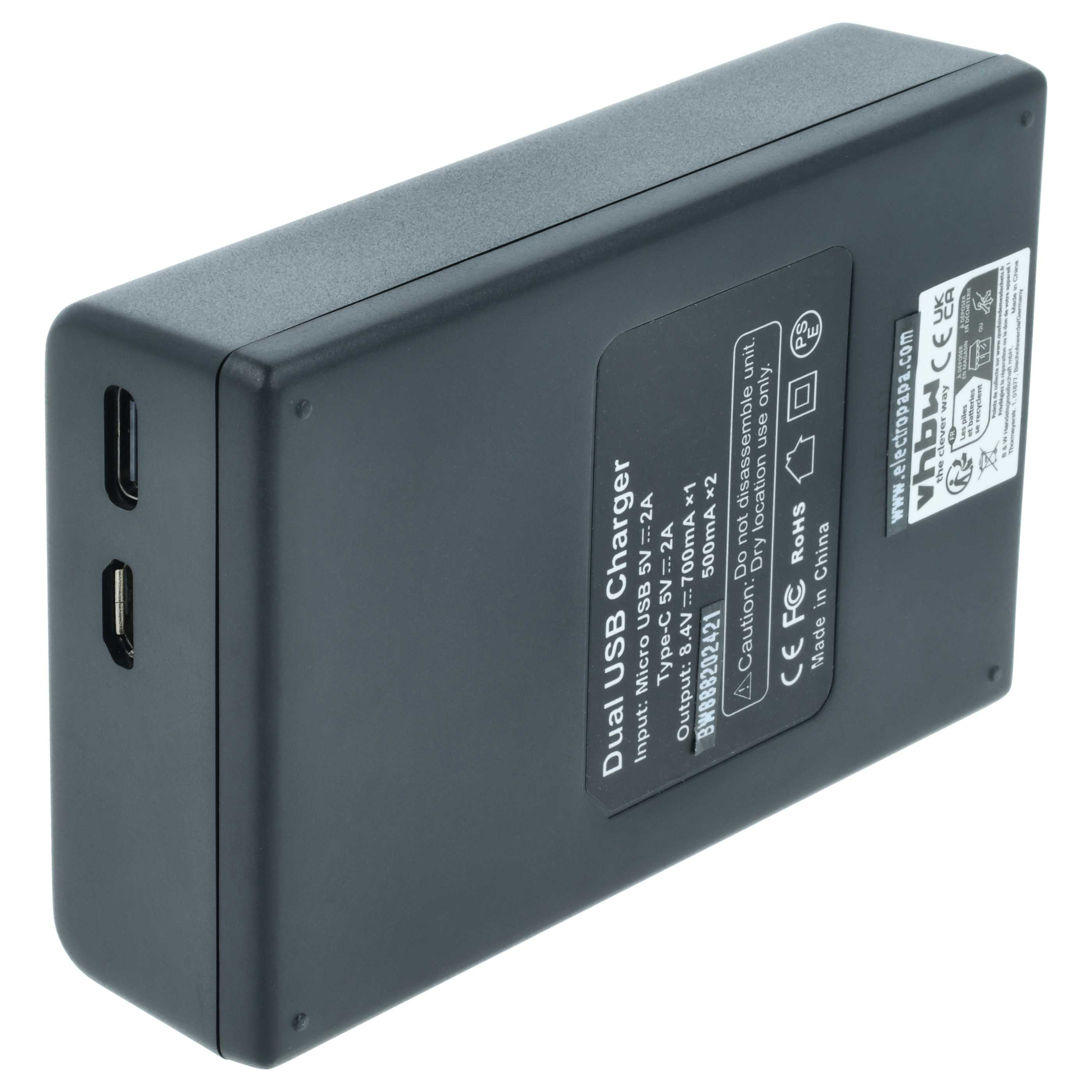 Schwarzes Dual-USB-Ladegerät mit technischen Daten auf dem Etikett.