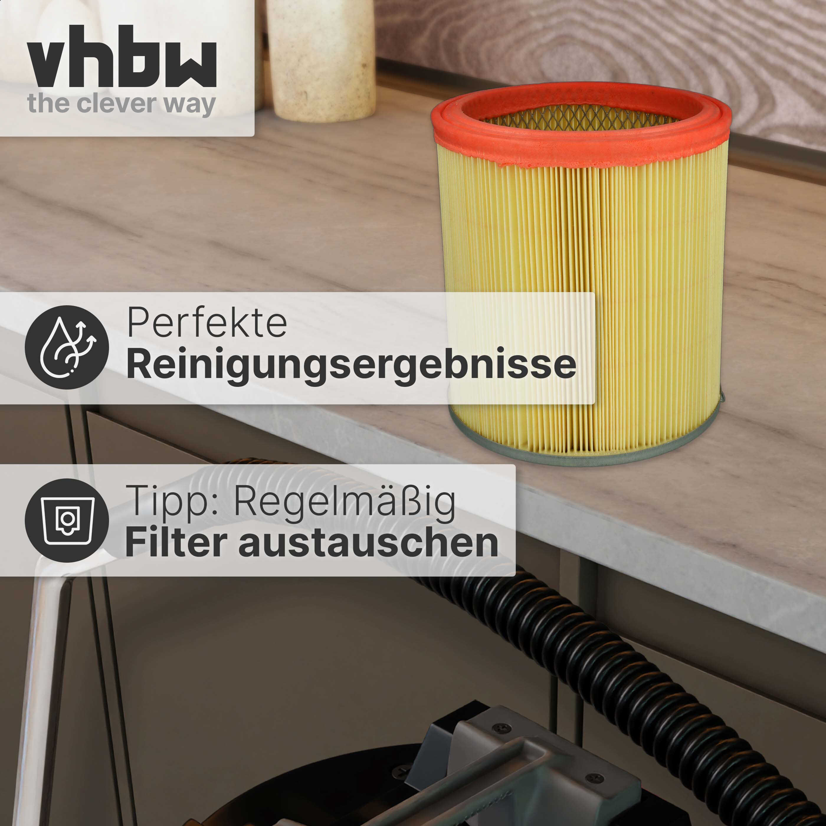 Zylindrischer gelber Staubsaugerfilter mit rotem Rand auf einem Tisch, mit Textfeldern und dem vhbw Logo.