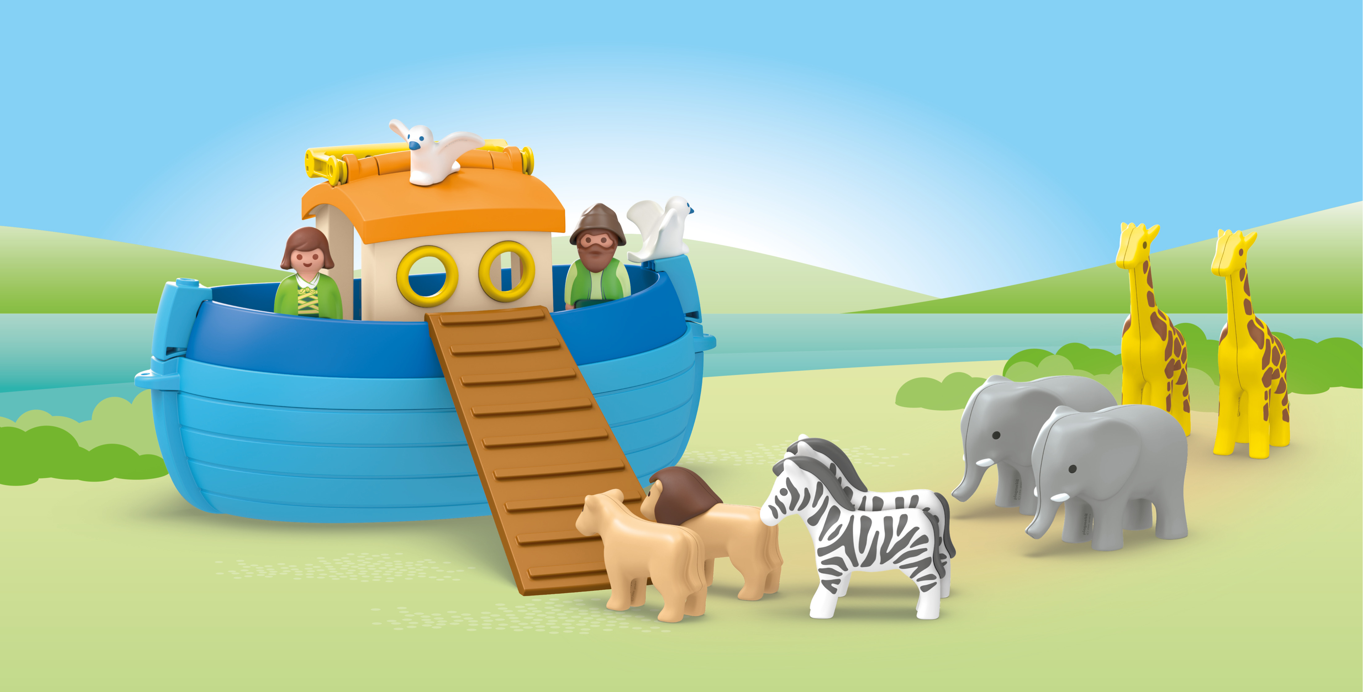 Playmobil Noahs Ark with animals like giraffes, elephants, zebras, and lions on a green field.