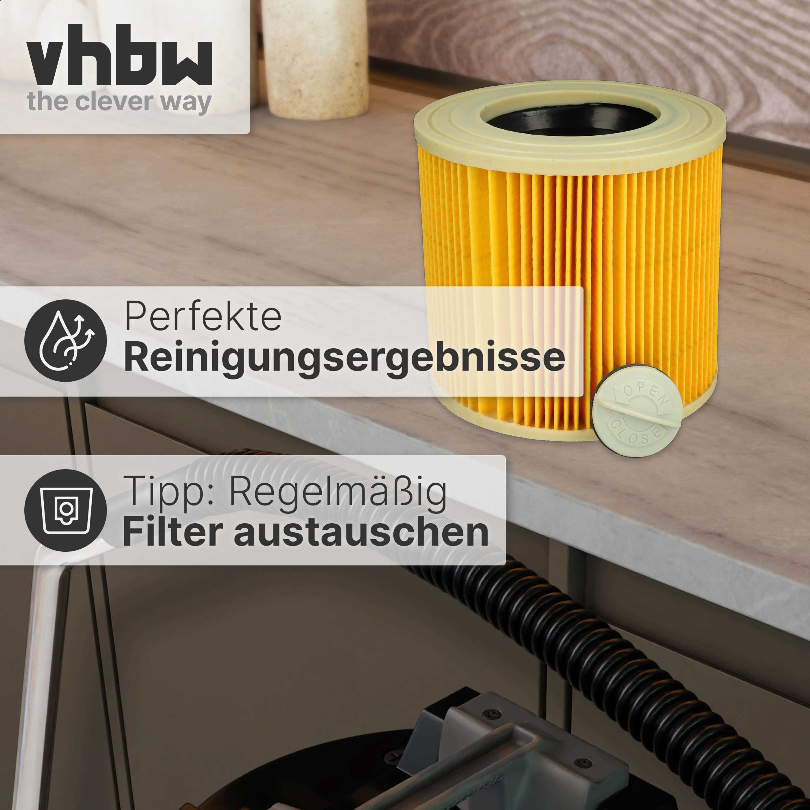 Gelber zylindrischer Staubsaugerfilter auf einer hellen Oberfläche mit Text und Logo.