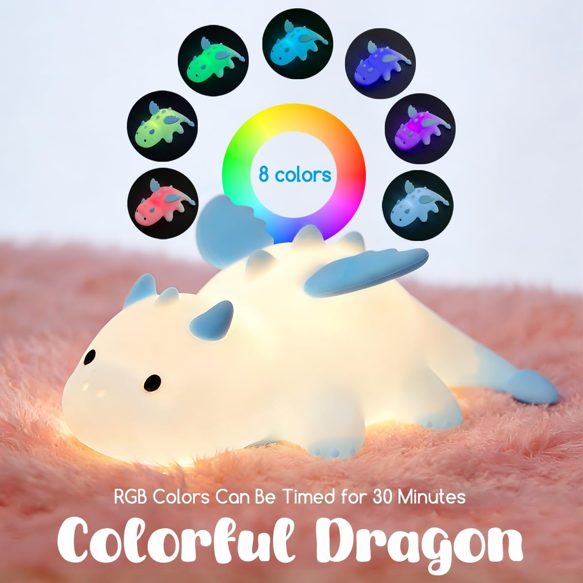 Ein weißer, leuchtender Drachen-Nachtlicht auf rosa Decke mit Farbauswahl.