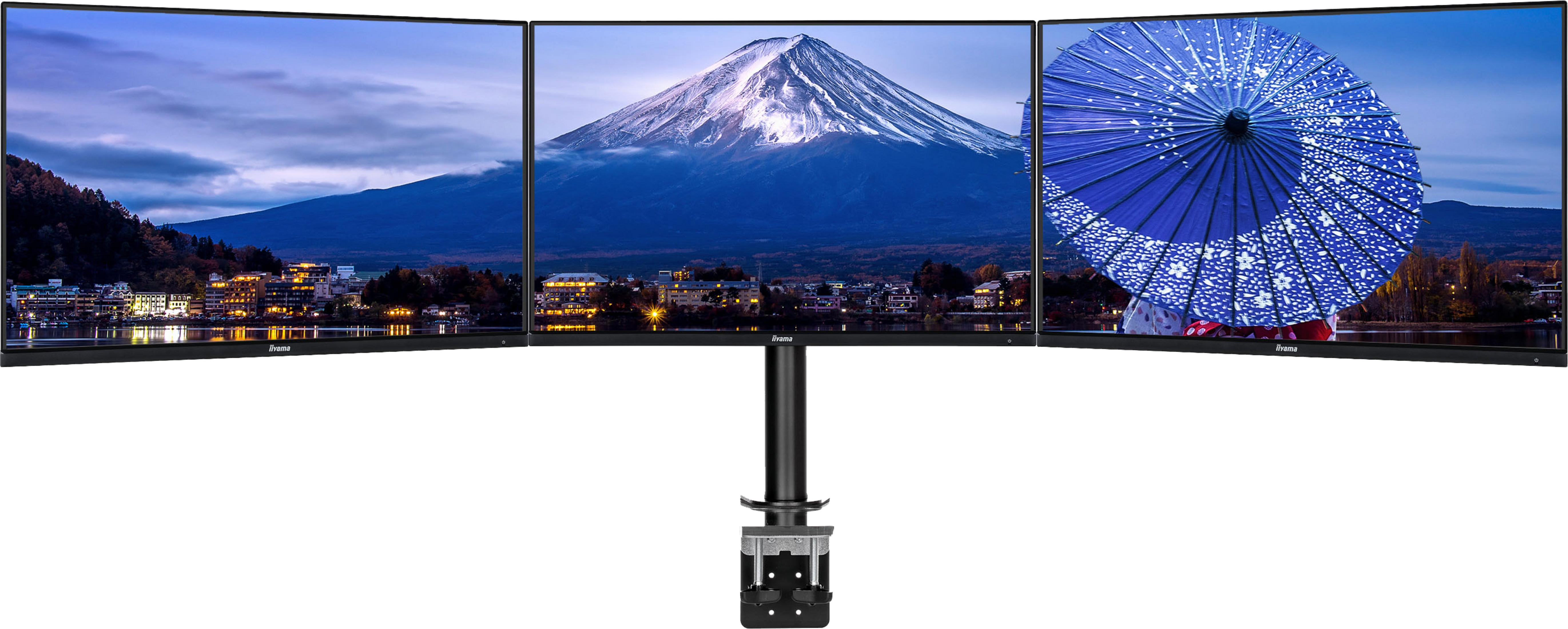 Drei Monitore an einem Halter zeigen Mount Fuji und einen Regenschirm.
