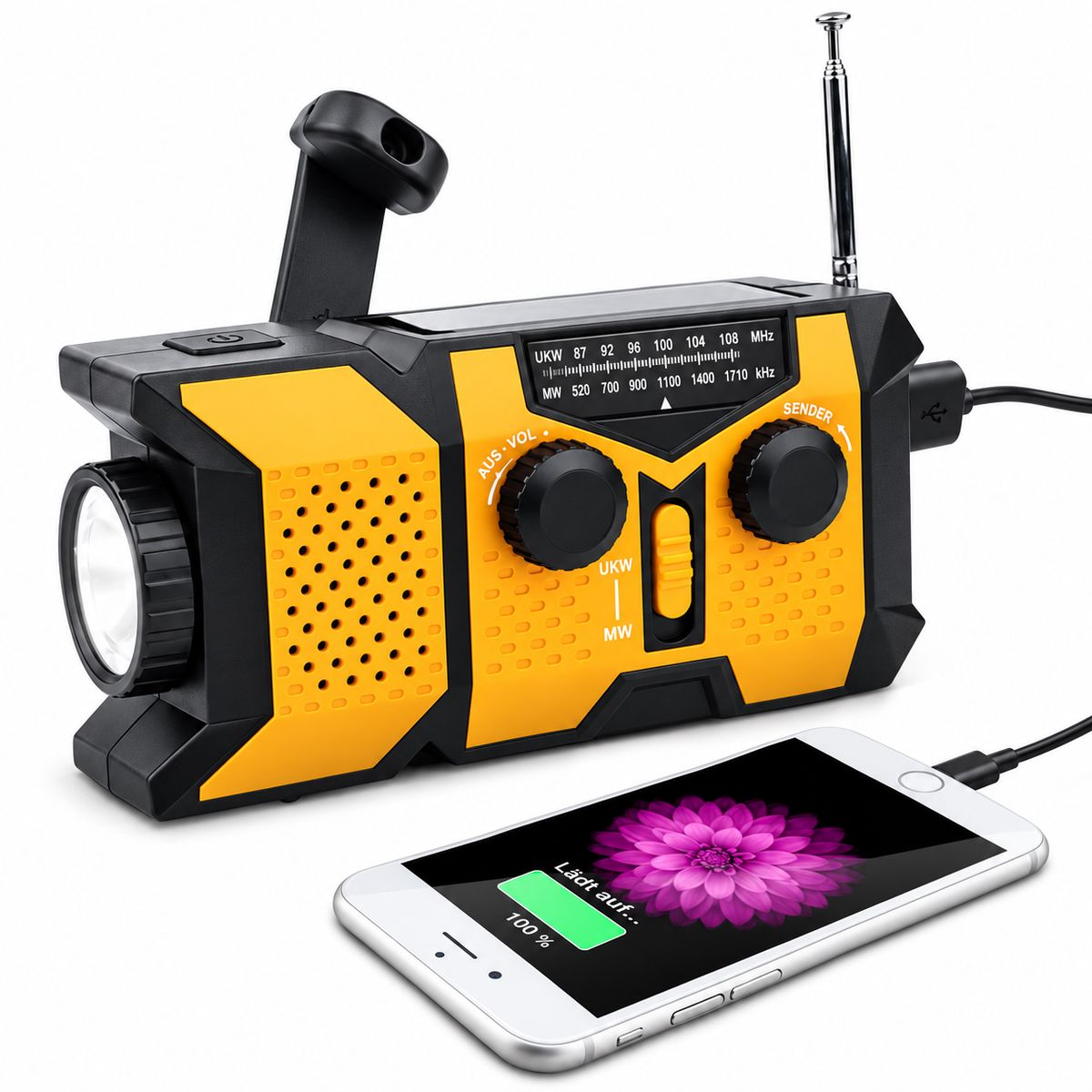 Gelb-schwarzes Notrufradio mit Kurbel, Taschenlampe und Antenne lädt ein Smartphone.