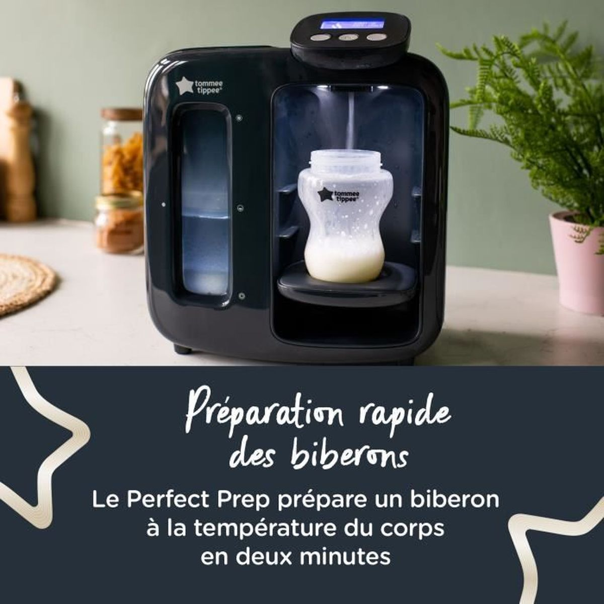 Ein schwarzer Tommee Tippee Flaschenzubereiter auf einer Küchentheke mit einer Flasche Milch.