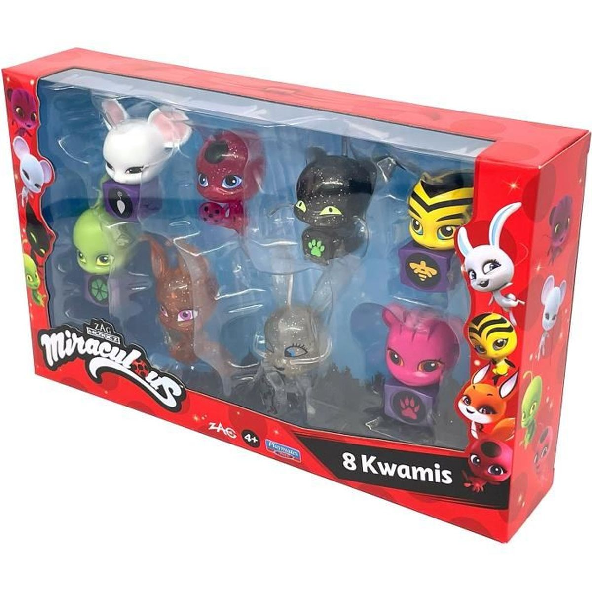 Eine rote Spielzeugschachtel zeigt acht bunte Miraculous Kwami-Figuren durch ein Sichtfenster.