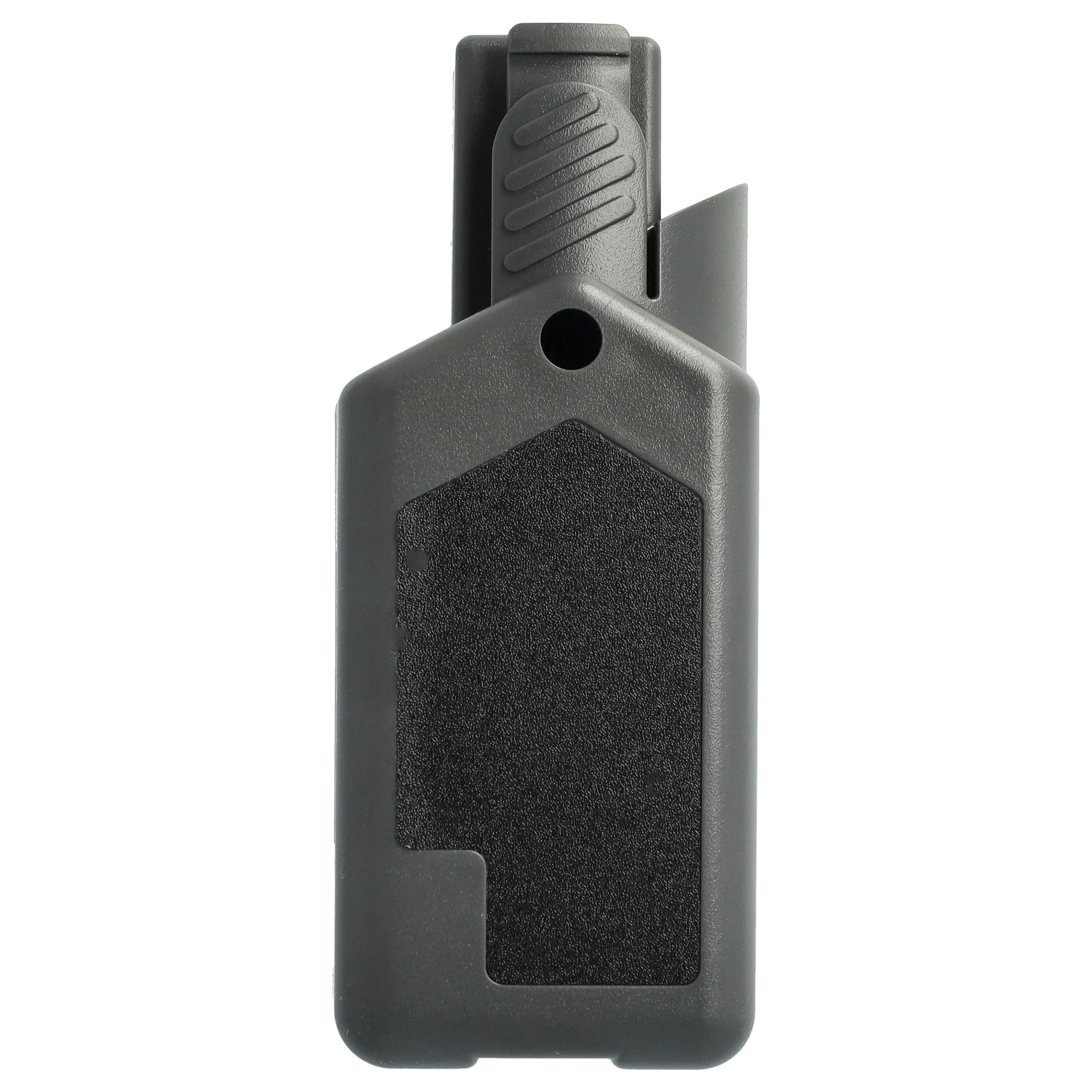 Ein graues Plastikholster mit Clip und strukturiertem Einsatz auf weißem Hintergrund.