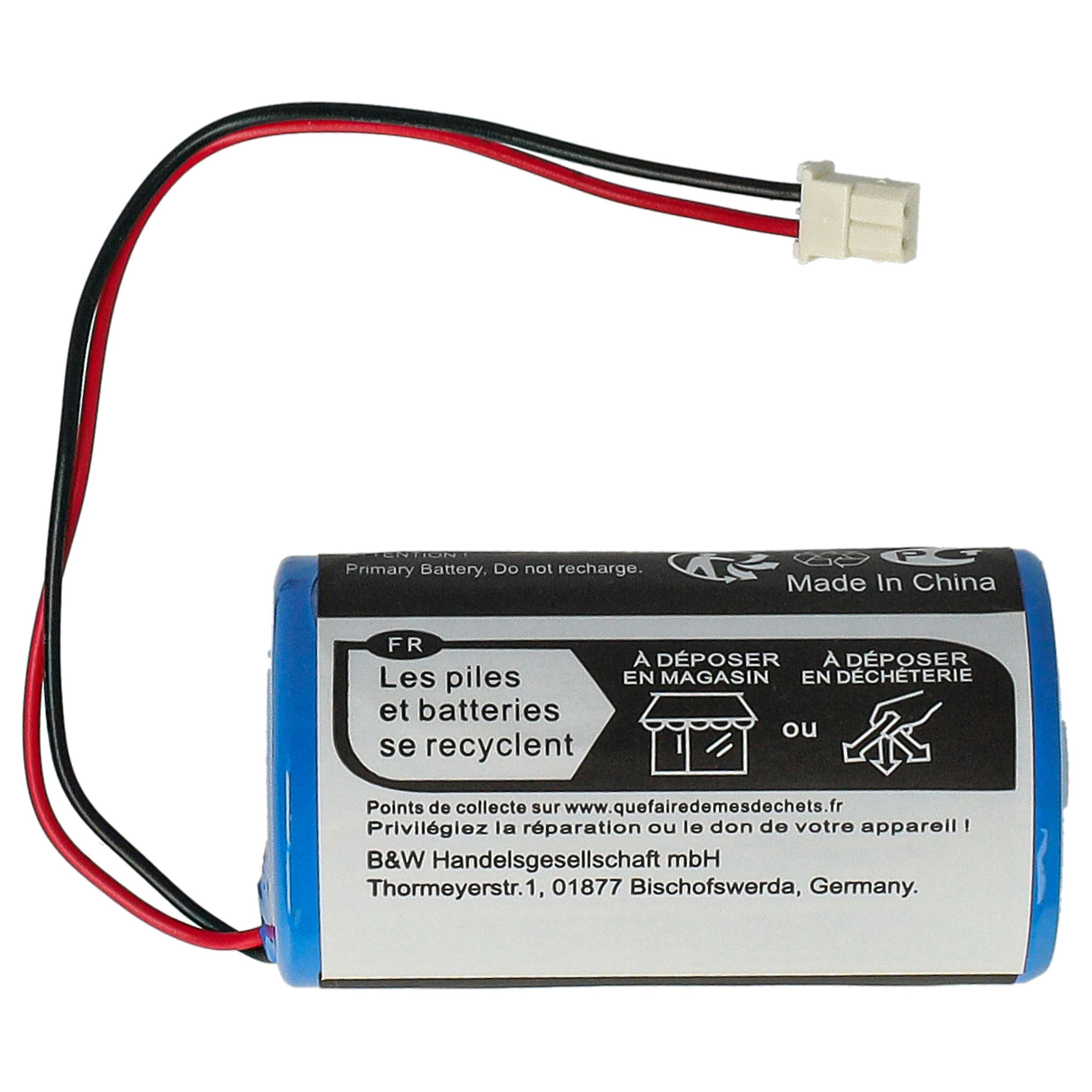 Eine blaue zylindrische Batterie mit roten und schwarzen Kabeln, die an einen kleinen weißen Stecker angeschlossen sind.