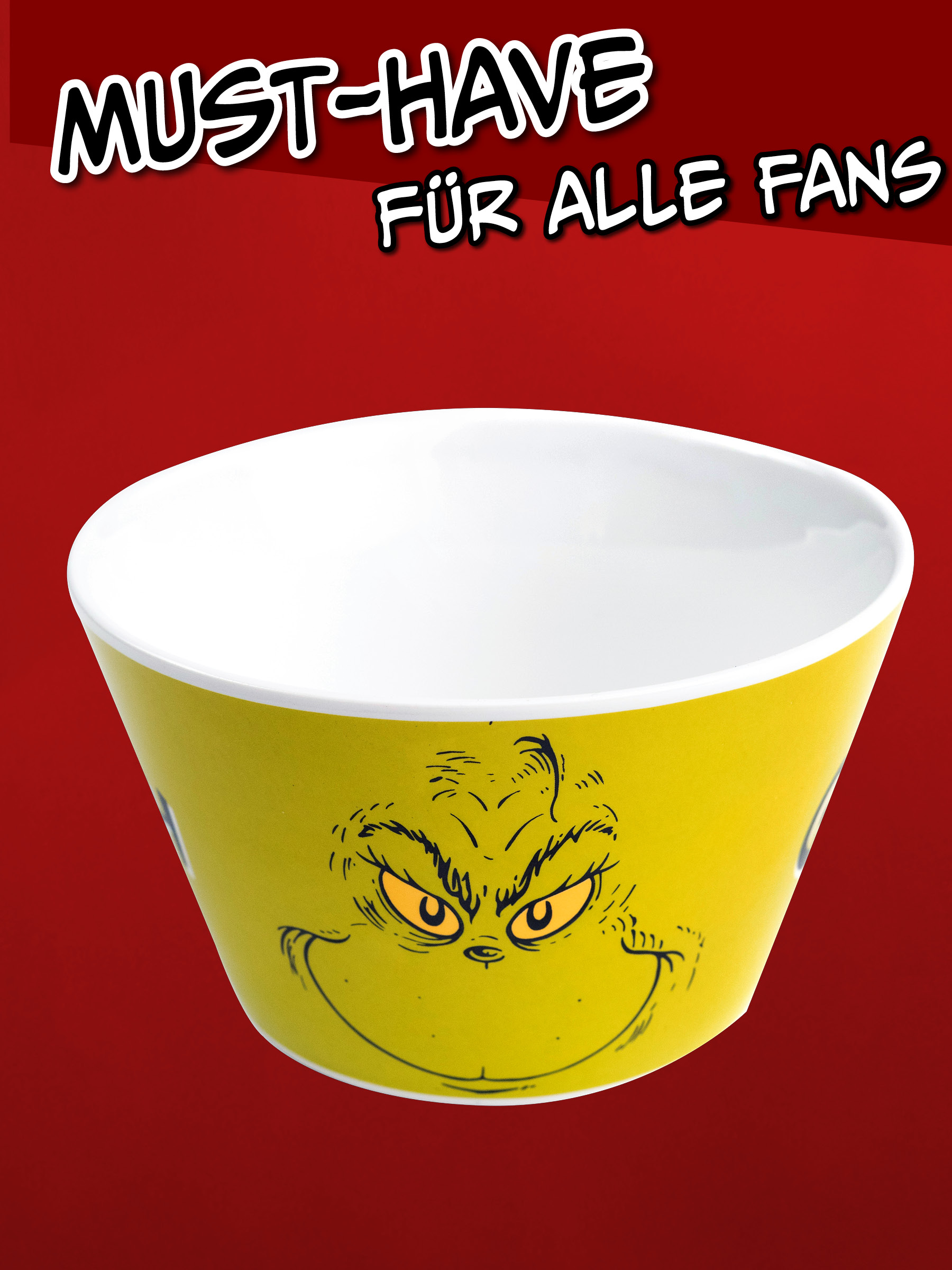 Gelbe Schüssel mit Grinch-Gesicht vor rotem Hintergrund.