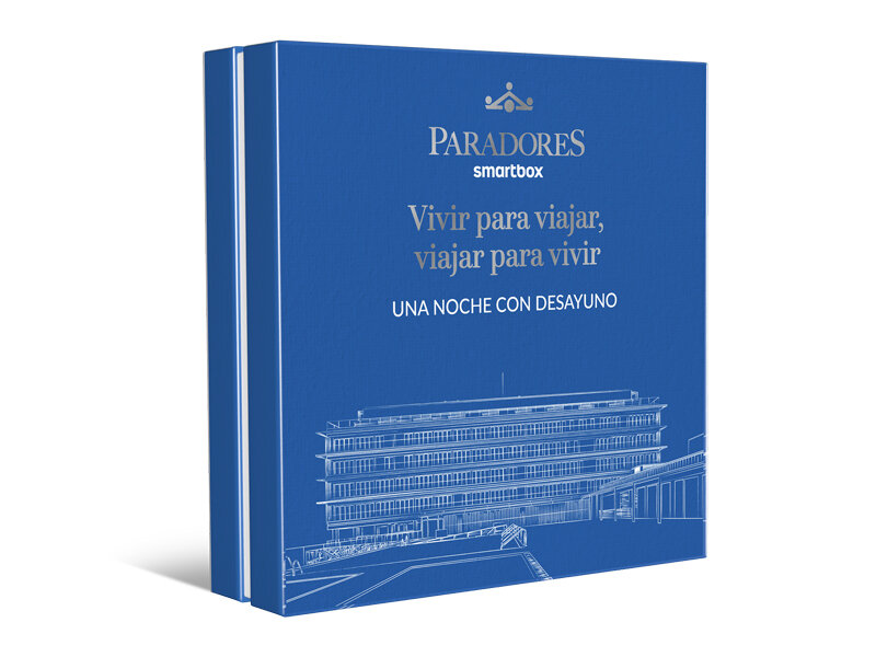Caja de regalo azul de Paradores Smartbox con ilustración de edificio blanco y texto al frente.