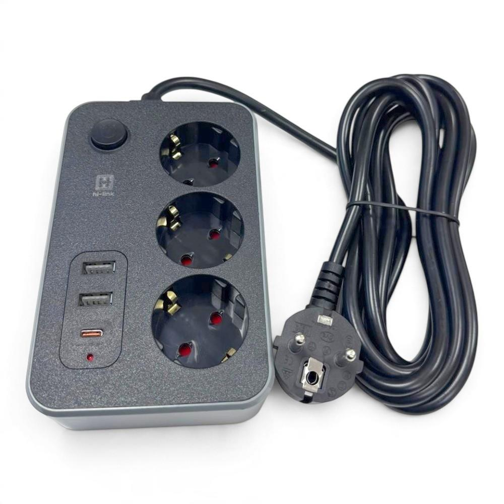 Üç prizli, üç USB bağlantı noktalı, anahtarlı ve kıvrık siyah kablolu siyah uzatma kablosu.
