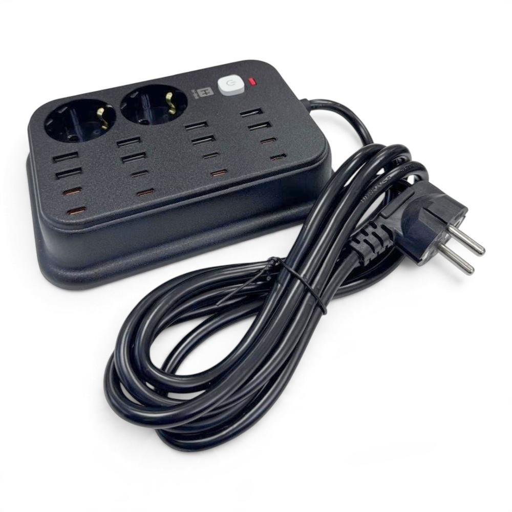 İki prizi ve çok sayıda USB bağlantı noktası olan siyah uzatma kablosu, kıvrılmış kablo ve fiş.