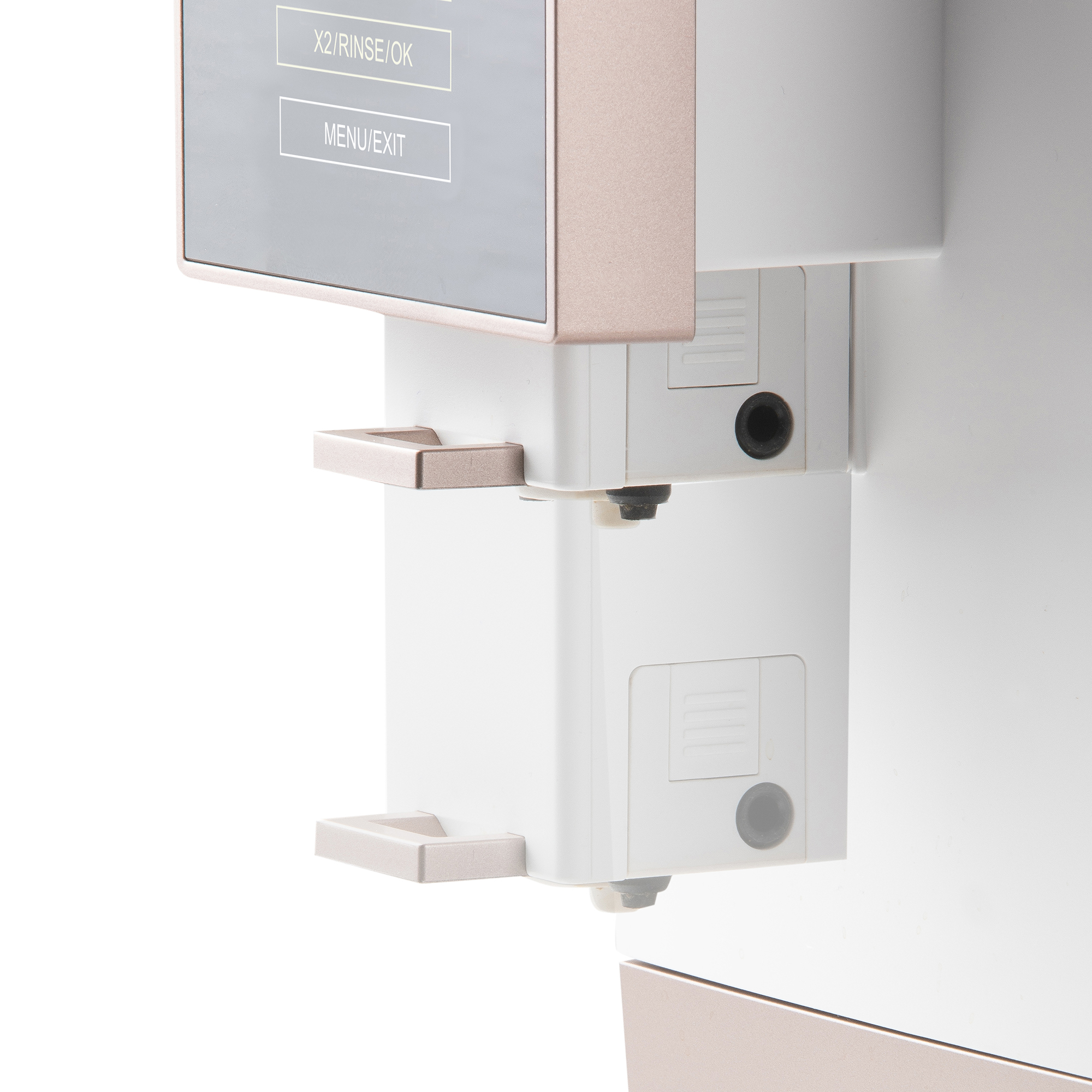 Close-up van een witte en roségouden koffiemachine met display en twee dispensers.