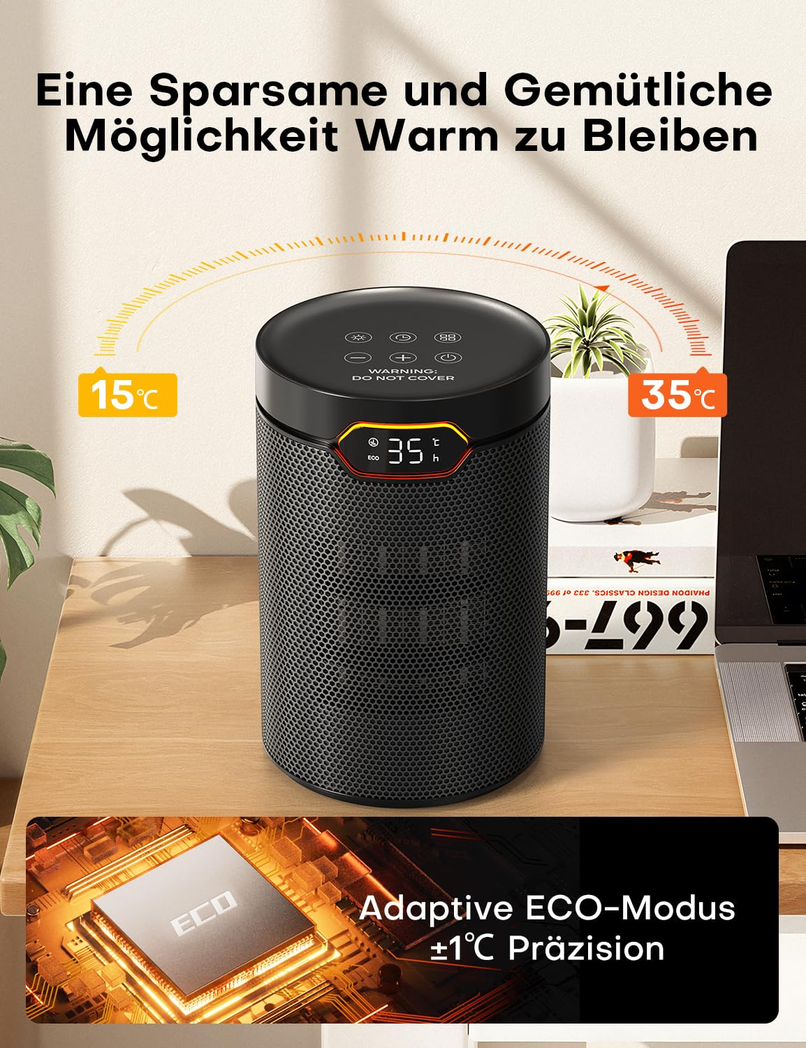 Ein zylindrischer schwarzer Heizlüfter mit digitaler Anzeige steht auf einem Holztisch neben einem Laptop.