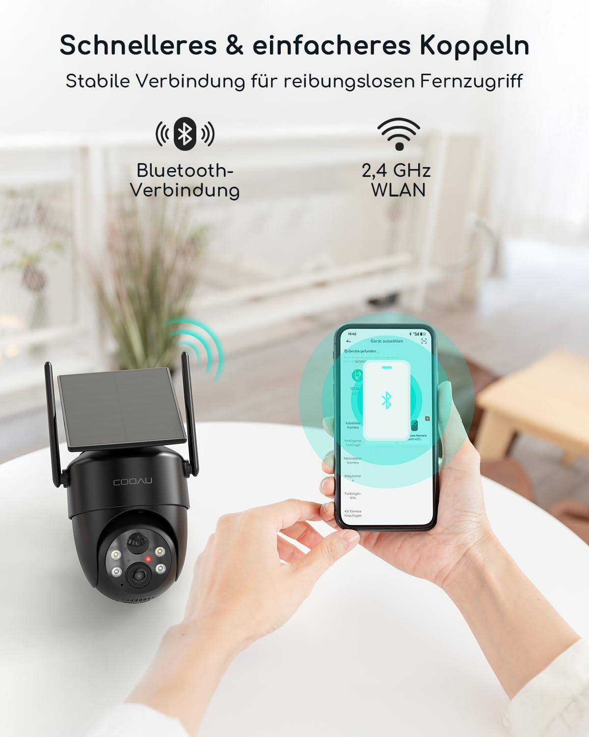 Smartphone verbindet sich per Bluetooth mit einer schwarzen Sicherheitskamera auf einem Tisch.