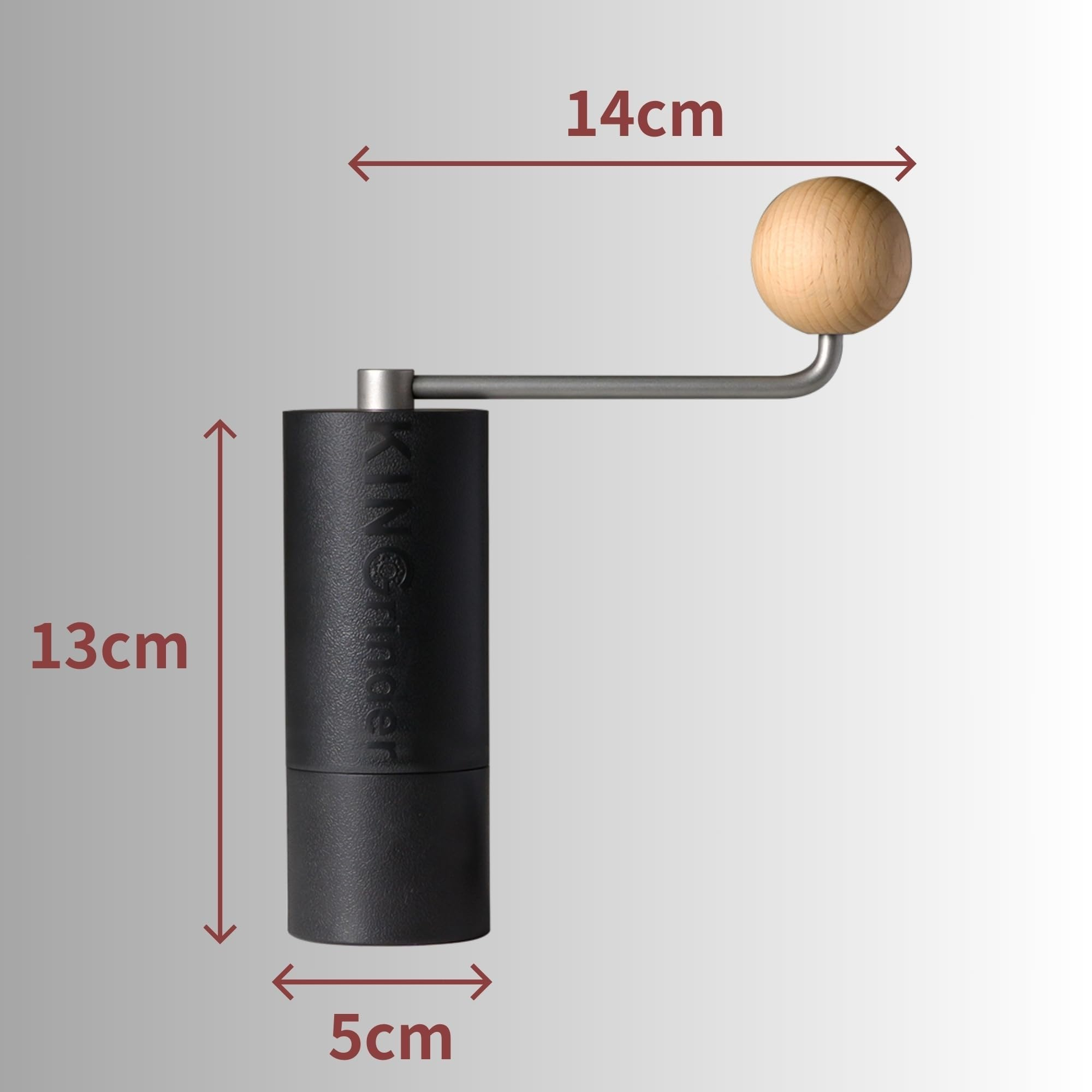 Macinacaffè nero con pomello in legno e dimensioni in centimetri.