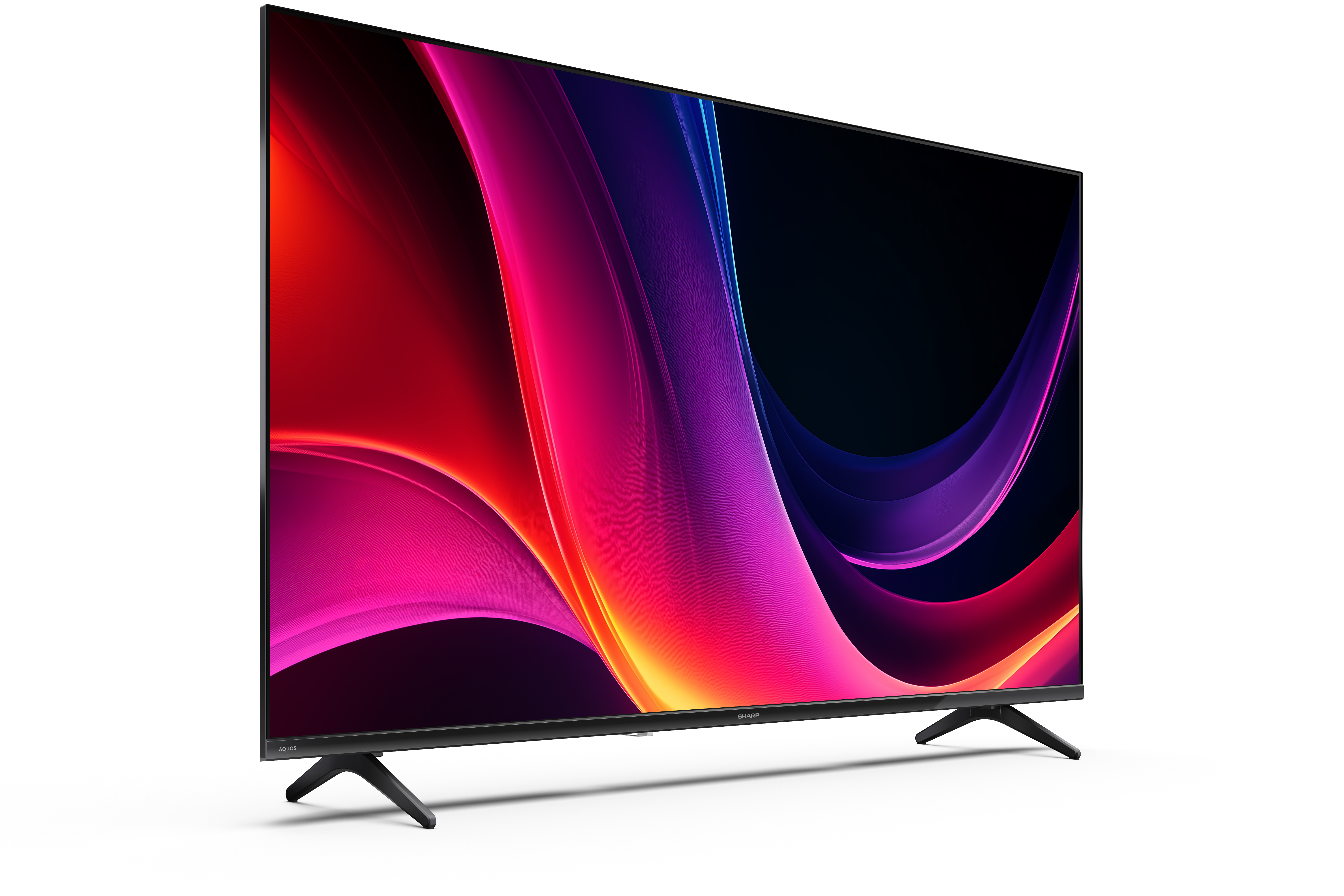 Nowoczesny telewizor Sharp z cienką ramką wyświetla żywą, abstrakcyjną grafikę w odcieniach czerwieni, fioletu i niebieskiego.