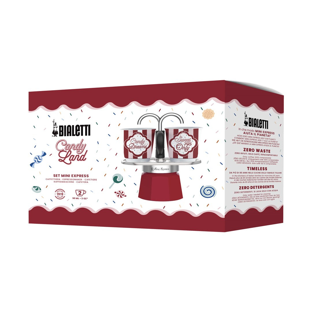 Confezione Bialetti Mini Express Candy Land con tazze rosse e bianche su base rossa e sfondo bianco.