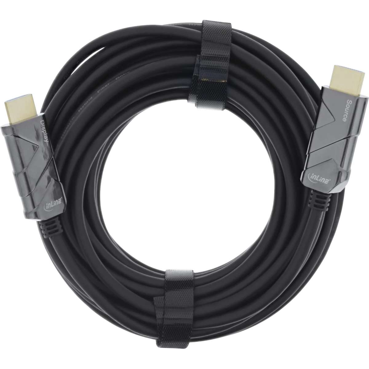 A coiled black HDMI cable with gray metal connectors on a white background.