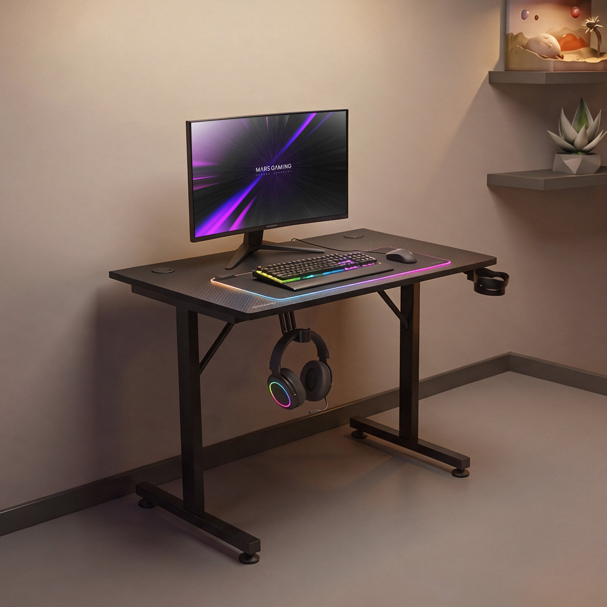 Escritorio negro para juegos con monitor, teclado, ratón y auriculares.