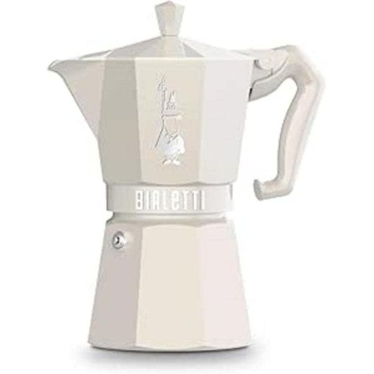 Una moka Bialetti bianco crema su sfondo bianco.
