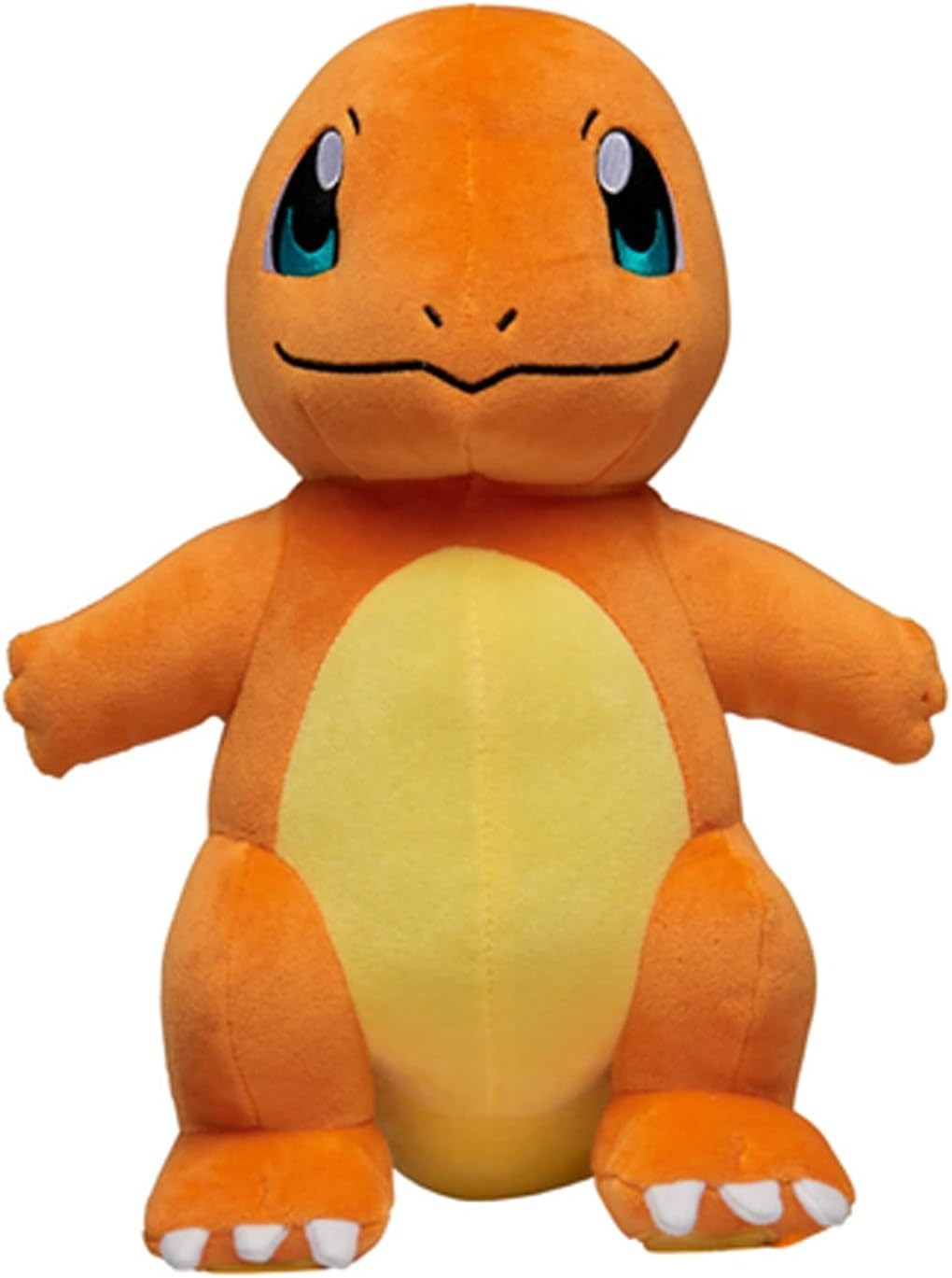 Un peluche suave naranja y amarillo del Pokémon Charmander con ojos azules y brazos cortos sobre fondo blanco.