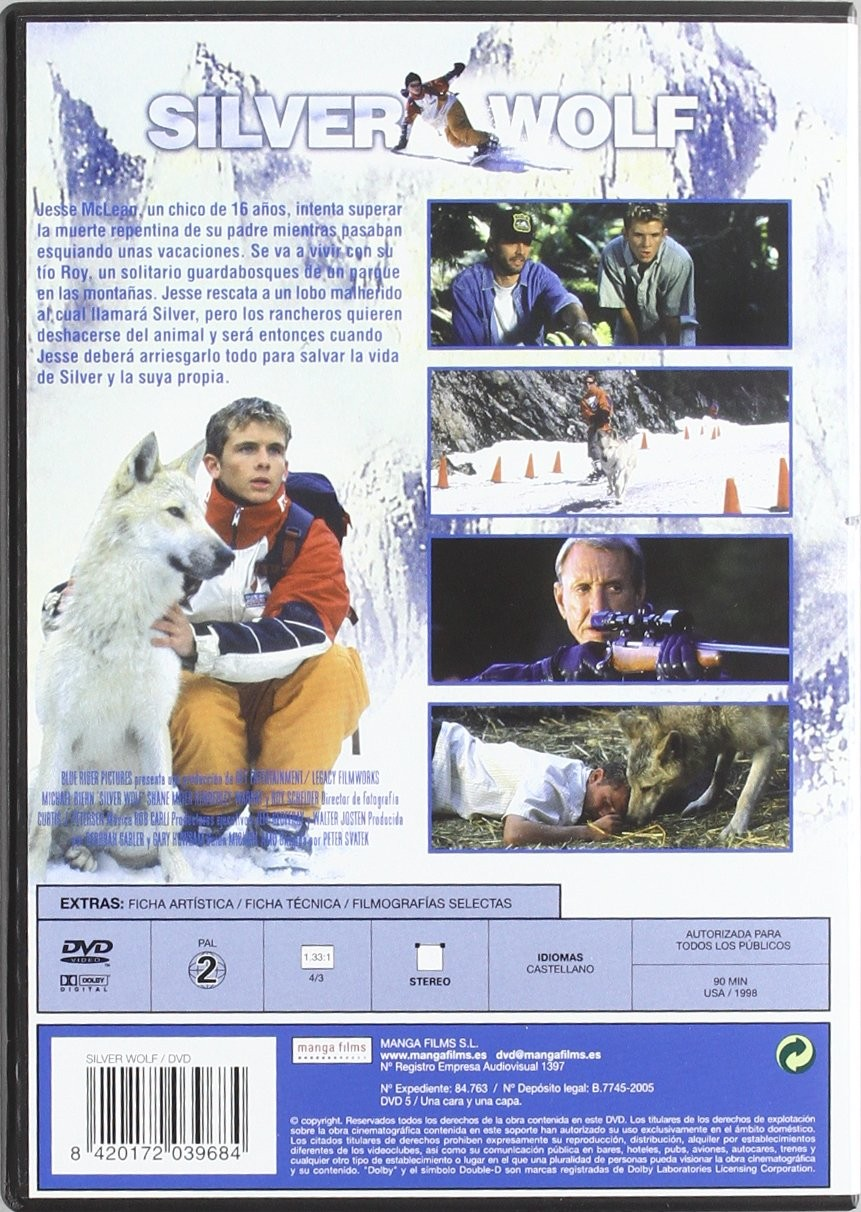 Contraportada de DVD de Silver Wolf con escenas de un chico, nieve y un lobo.