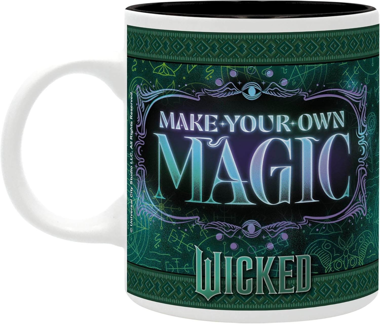 Una taza blanca con interior negro y diseño verde azulado con el texto 'Make Your Own Magic Wicked'.