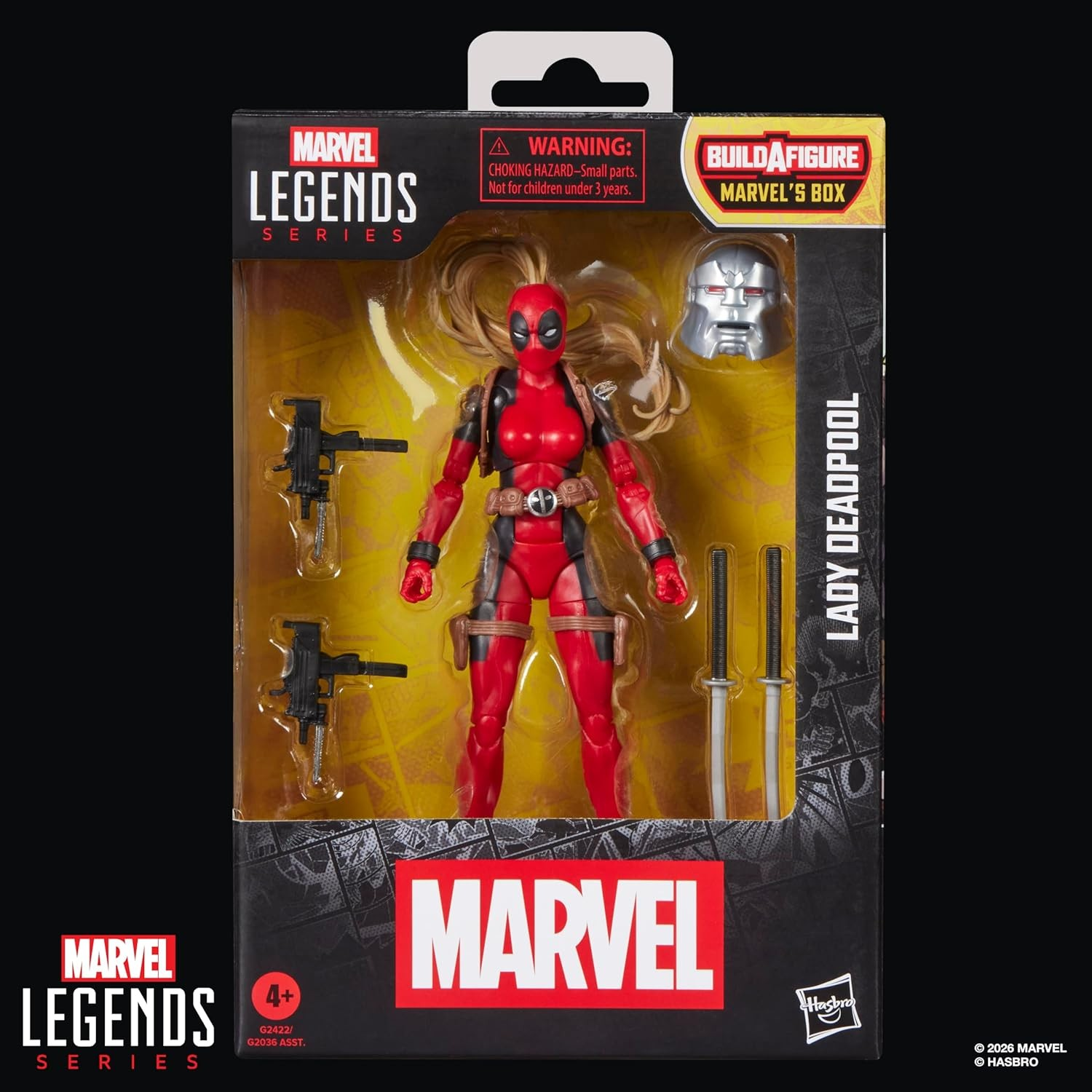 Marvel Legends Lady Deadpool Actionfigur in ungeöffneter Verpackung mit Waffen und extra Kopf.