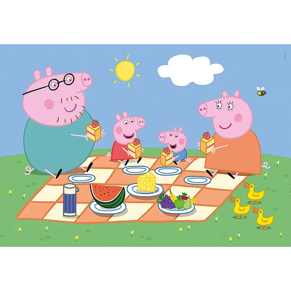 La familia de Peppa Pig hace un picnic en un prado con pastel, fruta y patitos.