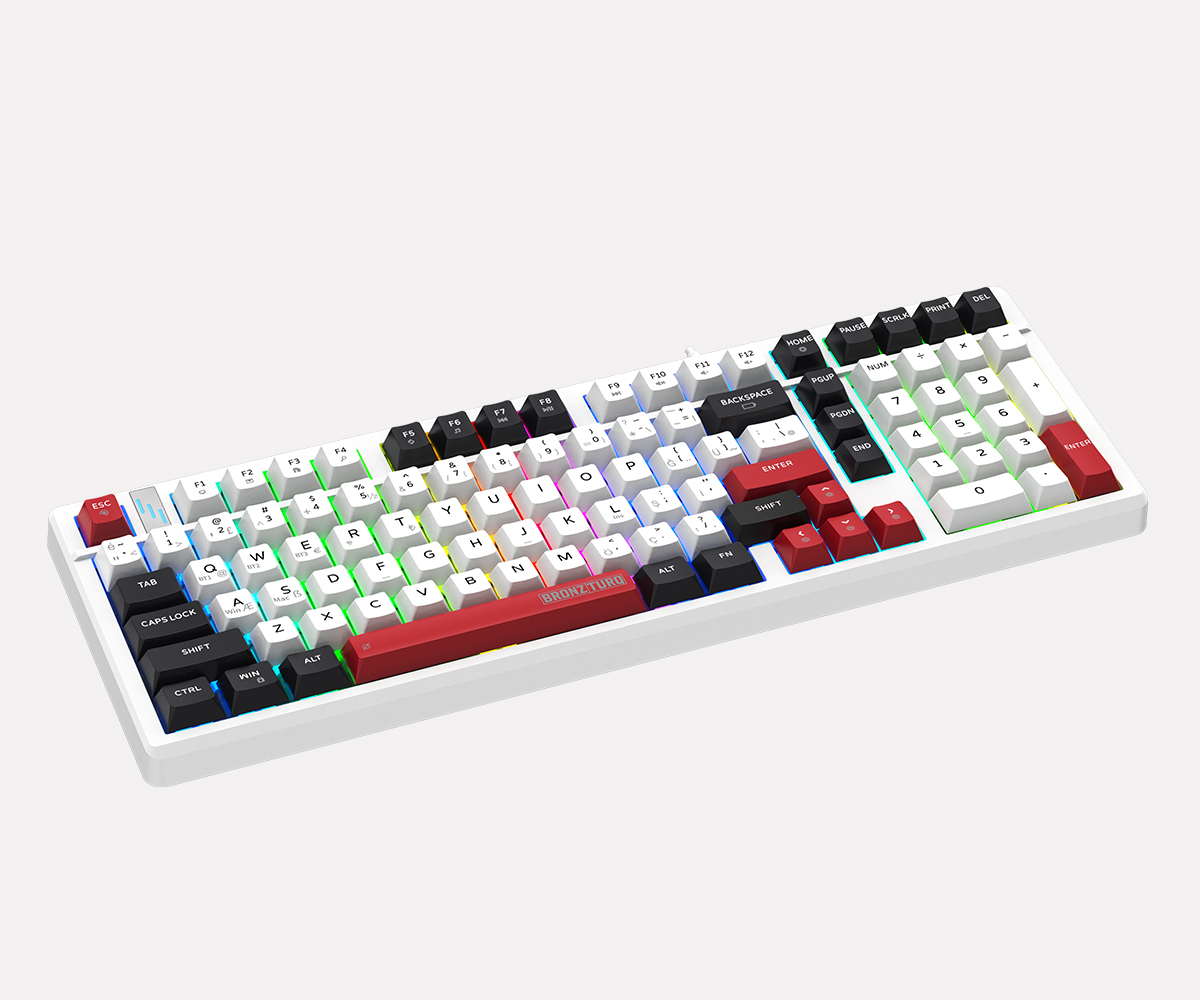 Siyah, beyaz ve kırmızı tuş başlıklarına ve RGB arka aydınlatmaya sahip beyaz mekanik klavye.