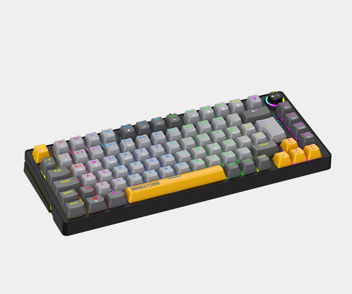 Gri ve sarı tuş kapaklarına ve renkli RGB arka aydınlatmaya sahip siyah mekanik klavye.