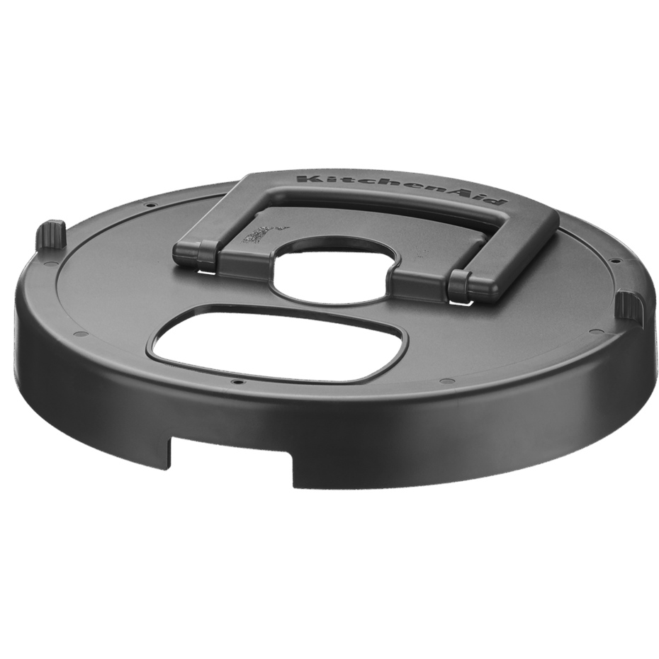 Beyaz arka planda orta tutma yeri ve iki büyük açıklığı olan siyah yuvarlak KitchenAid plastik kapak.